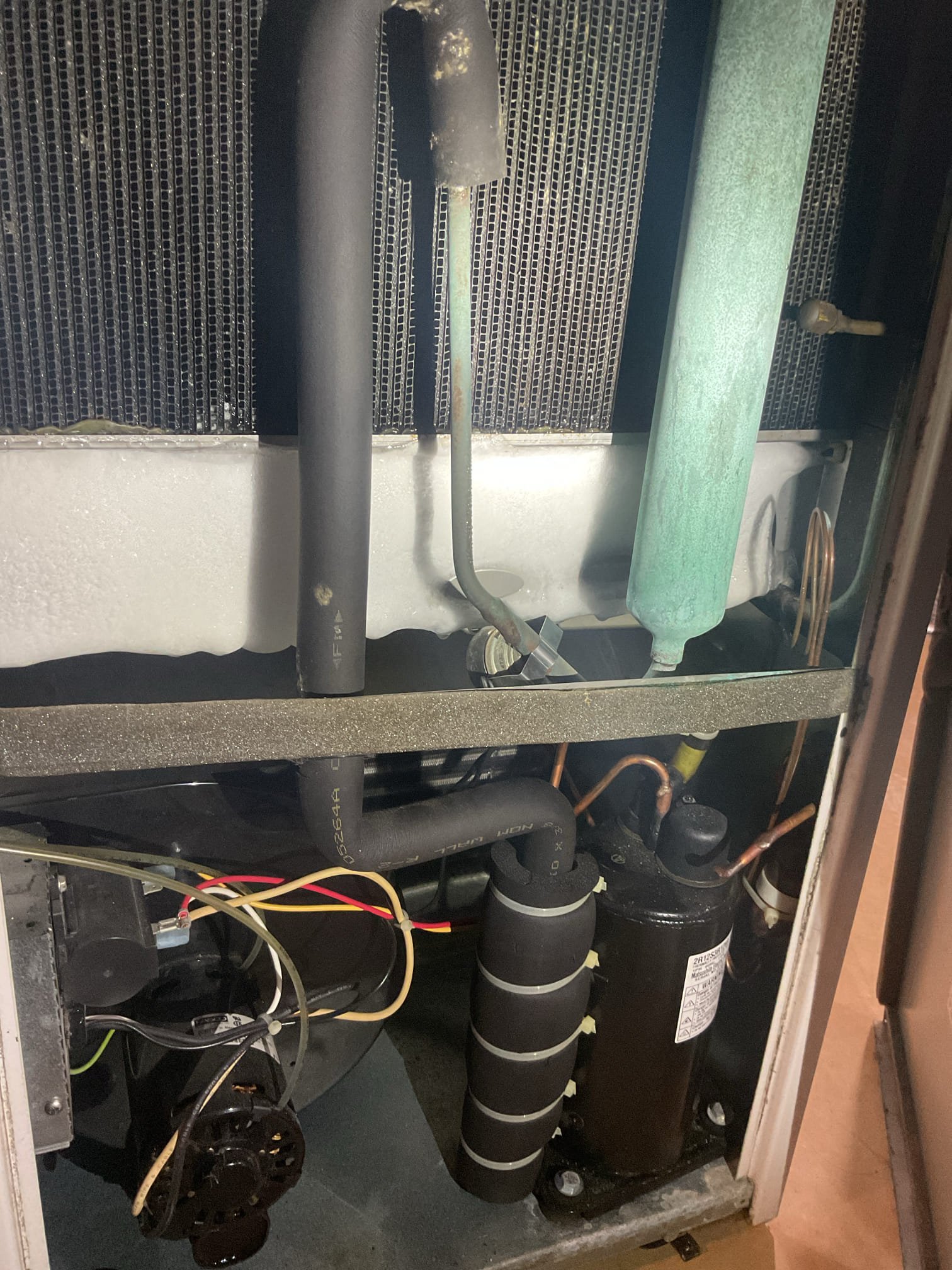 Performed precision heat tune up on amana heat pump system. Replaced aprilaire 213 air filter provided by homeowner. Humidifier pad is clean. Checked temperature rise. Inspected evaporator coil. Tested outdoor capacitor. Checked refrigerant pressures and temperature at indoor and outdoor units. Checked all electrical connections and components. Found 20 year old stand alone dehumidifier frozen up and not working at all, provided estimate to replace dehumidifier. 
Will install dehumidifier in drain pan with float switch. Drain to gravity to sump pit. 