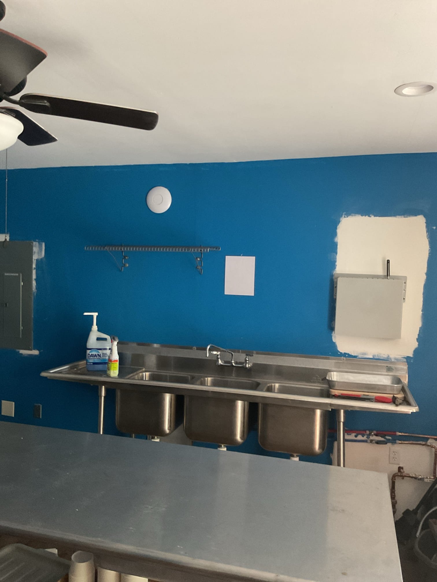Took photos and videos of up and coming BBQ/Kitchen on campus.

Room dimensions are 15’x15’ with 8’ ceilings. There is a kitchen with new commercial sink inside. 
Doorway to outdoor over patio. Will be used as a recreational/kitchen/outdoor dining area. 

They are interested in installing a Minisplit.

Note to Dibiase Staff: if you look up my visit under “Weld Shop” 4/30/25 you will see more relevant photos/measurements/videos. 