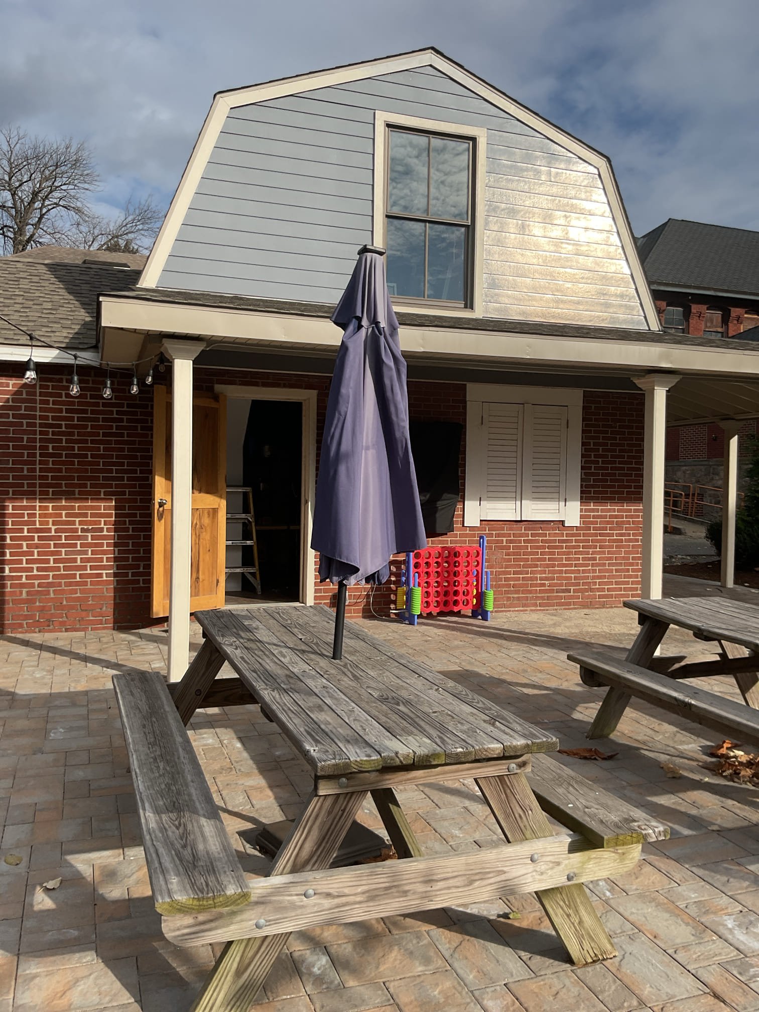 Took photos and videos of up and coming BBQ/Kitchen on campus.

Room dimensions are 15’x15’ with 8’ ceilings. There is a kitchen with new commercial sink inside. 
Doorway to outdoor over patio. Will be used as a recreational/kitchen/outdoor dining area. 

They are interested in installing a Minisplit.

Note to Dibiase Staff: if you look up my visit under “Weld Shop” 4/30/25 you will see more relevant photos/measurements/videos. 