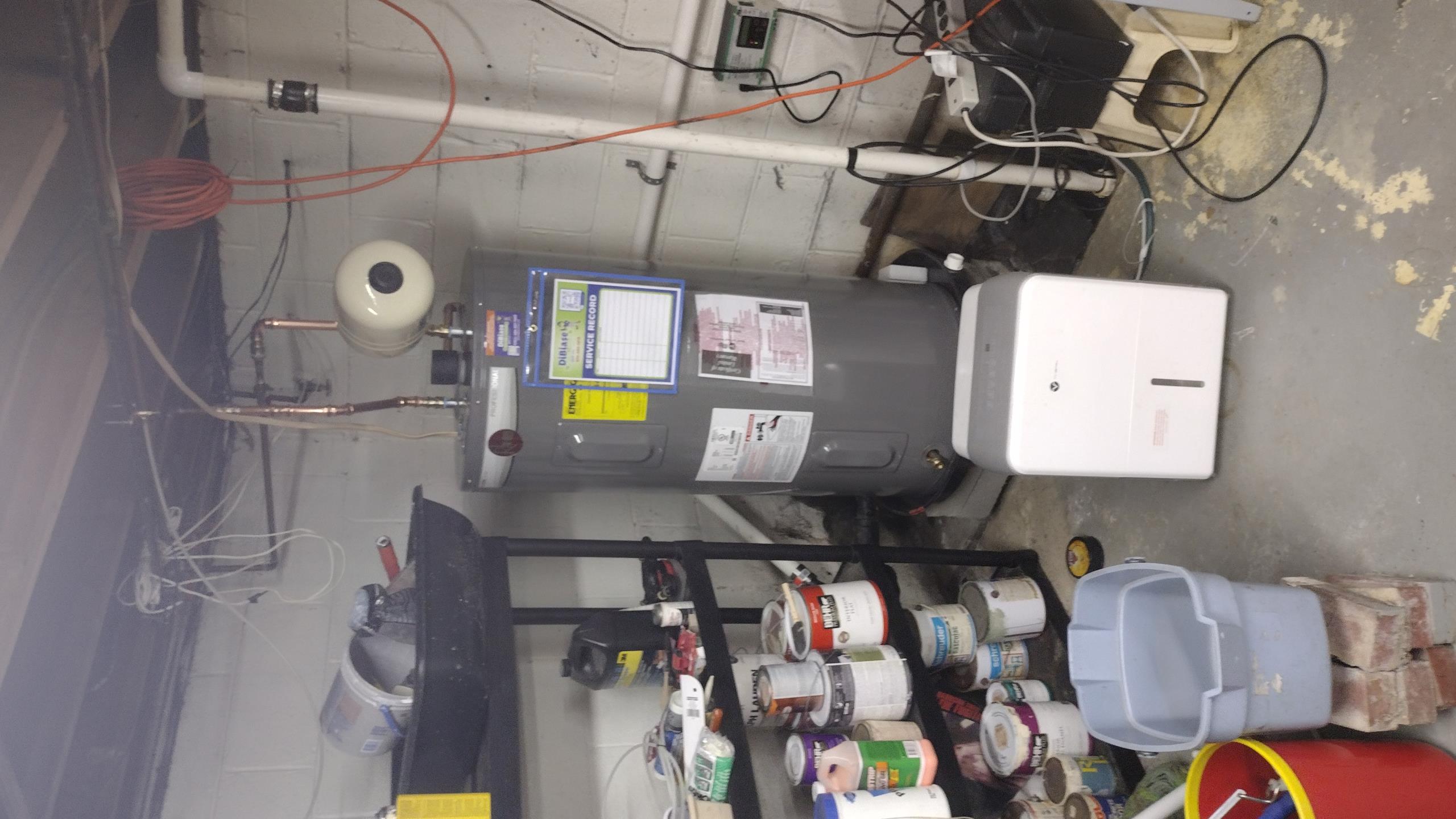 Cut new opening on floor (craw space) installed new boot 4x12, run flex from coupling and new location. Attached flex to new boot and also attached to trunk. (Currently is disconnected). We also replaced water heater. Remove old 50 gallon electric tank, installed new tank modified piping as needed, installed new pan and water sensor, check connections for leaks no leaks, purge all lines and test electrical upper and bottom element ok check water pressure and installed new expansion tank with installation. Water heater is heating number normal condition. New run is now blowing air. Collected remaining balance card on file. Customer approved charging same card. We also tried to put some insulation back in place it would not stayed in place. 
