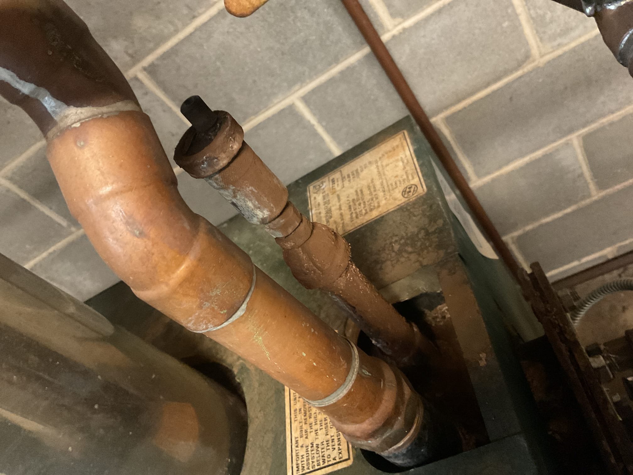 Talked to Joann when I arrived about hot water situation. She mentioned that recently the hot water has been ok but not as much pressure. Ran hot water at faucet and was getting decent pressure at basement sink. Ran all other fixtures in home all had good flow and hot water except kitchen sink faucet she just had installed, she is going to call back that plumber. Found auto air vent on top of boiler hissing a lot possibly sucking air into system, provided estimate to replace auto air vent and 1/2” mixing valve. Mixing valve is older. 