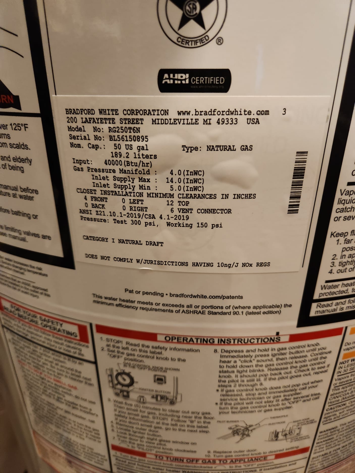 Drained and removed existing water heater. Set new 50 gallon gas water heater in new drain pan with water alarm. Adapted hot and cold sides to new water heater including new brass tee nipple and 90 for new expansion tank. Filled water heater lit pilot flame and ensured proper operation 