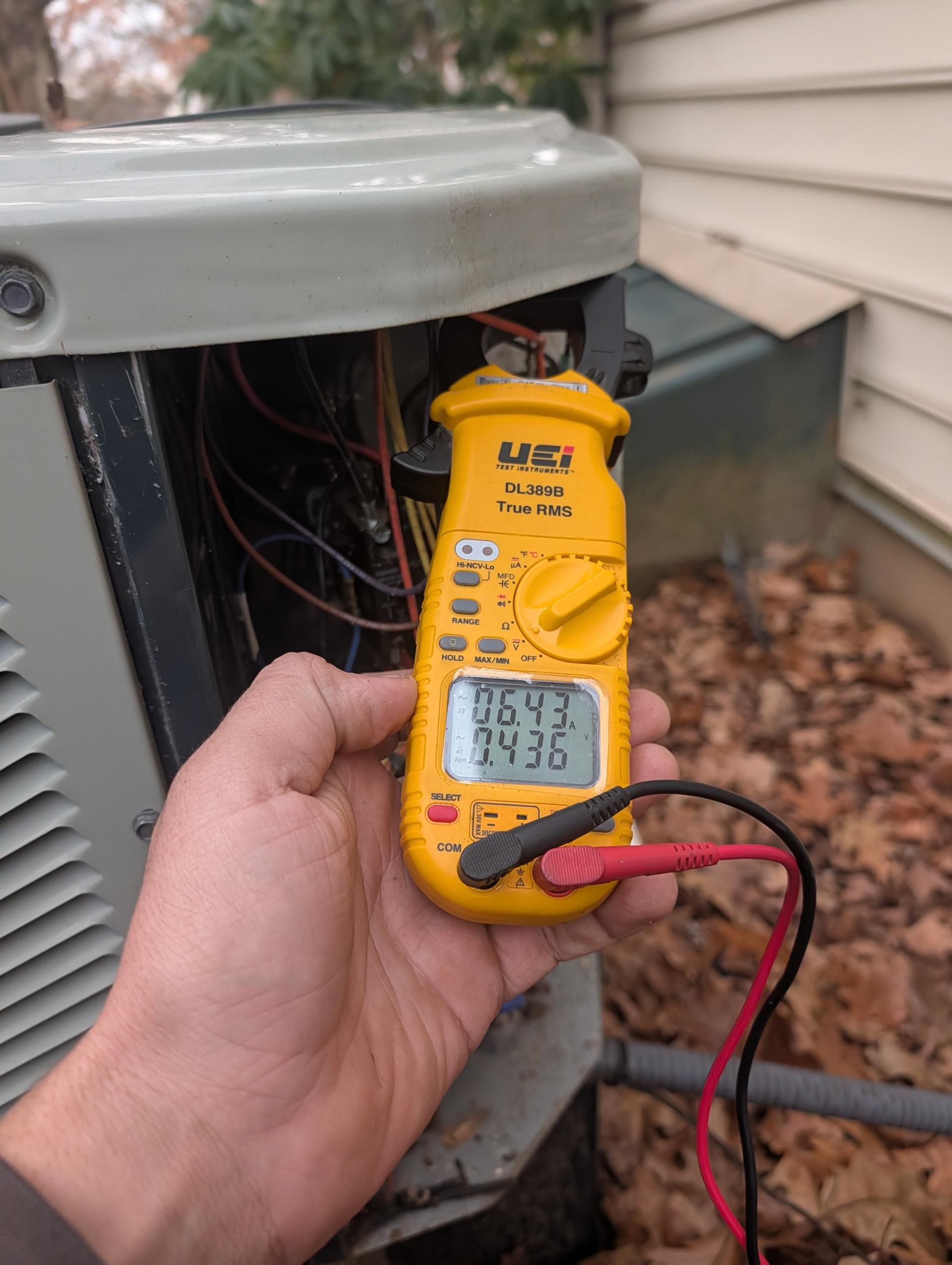 There is no auxiliary electric heater in air handler. So when heat pump goes into defrost the result is very cold air in supply ducts.
Auxiliary heat is oil boiler with 3 zones. 3 separate thermostats control boiler. There is no isolation relay from heat pump/air handler thermostat

I also explained that generally when operating in heat mode the air may “feel” cold at 87-90° because even though it is hot enough to heat the house it is cooler than body temperature.

Completed heat tune up for 3.5 Ton Amana heat pump system

20x22x1 filter ok 
Indoor and outdoor coils in good condition 
Inspected wiring, controls, electric motors and components; equipment does not have surge protection 
Measured temperature rise (67-95=28°) and static pressure 
Inspected drain. Drain does not have overfill protection; left estimate for EZ trap. 
Checked integrity of compressor motor (mega ohm test)
Observed 1 complete defrost cycle.

I moved compressor lockout on thermostat from 30° to 35°. 

Assessed re