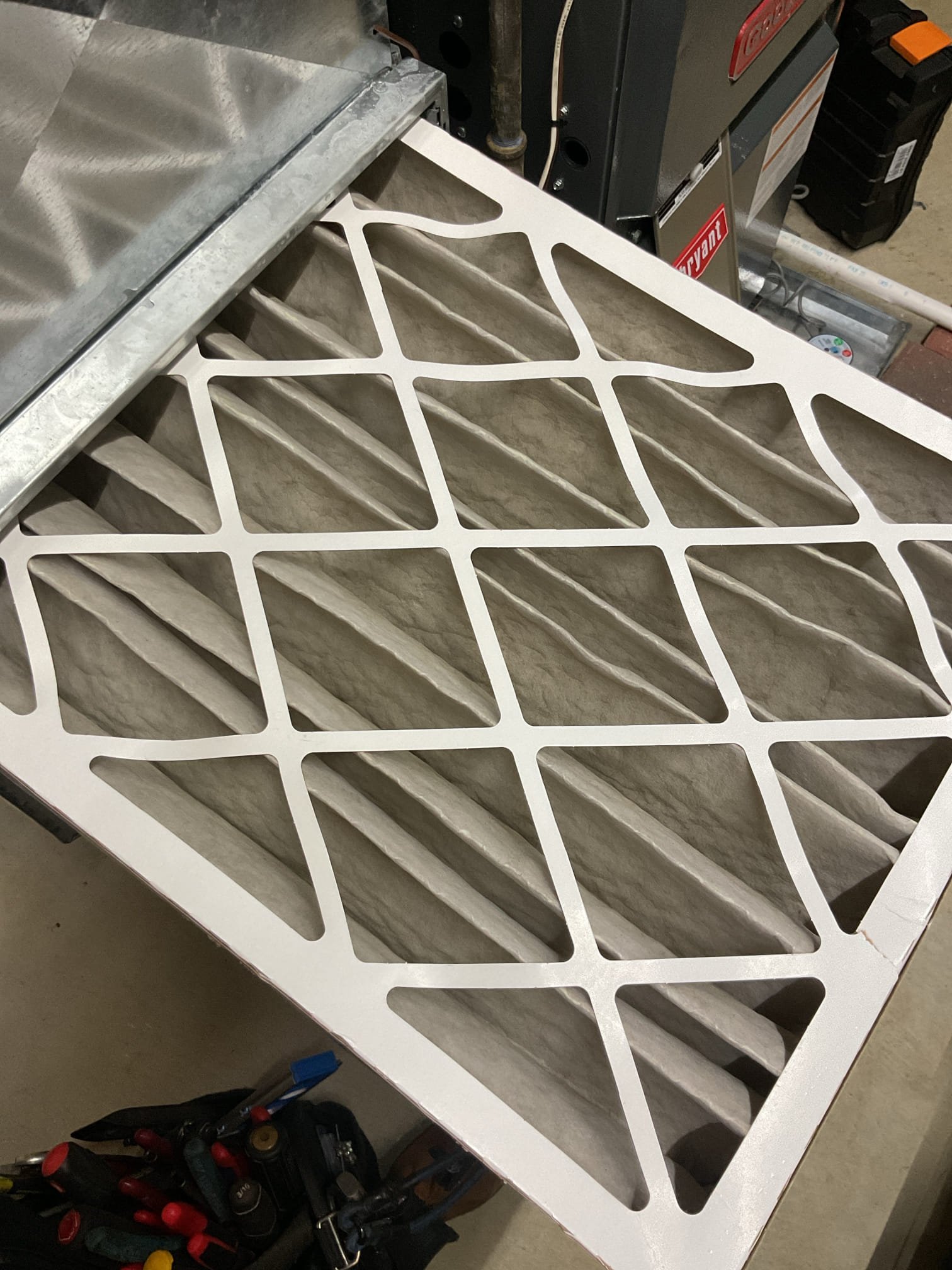 
Completed heat tune up for natural gas furnace.

Homeowners will replace 20x25x4 filter soon
Inspected heat exchanger, burners, flue pipe, inducer assembly and hoses.
Propane burners are very corroded. There have already been no heat issues caused by burners back to 2023. Burners are worse now. I removed buildup of rust from crossover ports. Strongly recommend upgrading burners to stainless steel. 
Inspected hot surface ignitor and verified resistance with meter
Cleaned flame sensor and verified flame rectification circuit
Measured temperature rise and static pressure
Checked wiring, controls, electric motors and components; there are no surge protectors; left estimate for a surge protector for each of the 2 main circuits of system
Checked manifold gas pressure; there is an appliance connector inside furnace compartment. Needs to be hard piped. Provided previous estimate to repair. 
Inspected drain and pump. 

Combustion, draft and smoke tests: Pass

After discussing with Mr. Seaman h