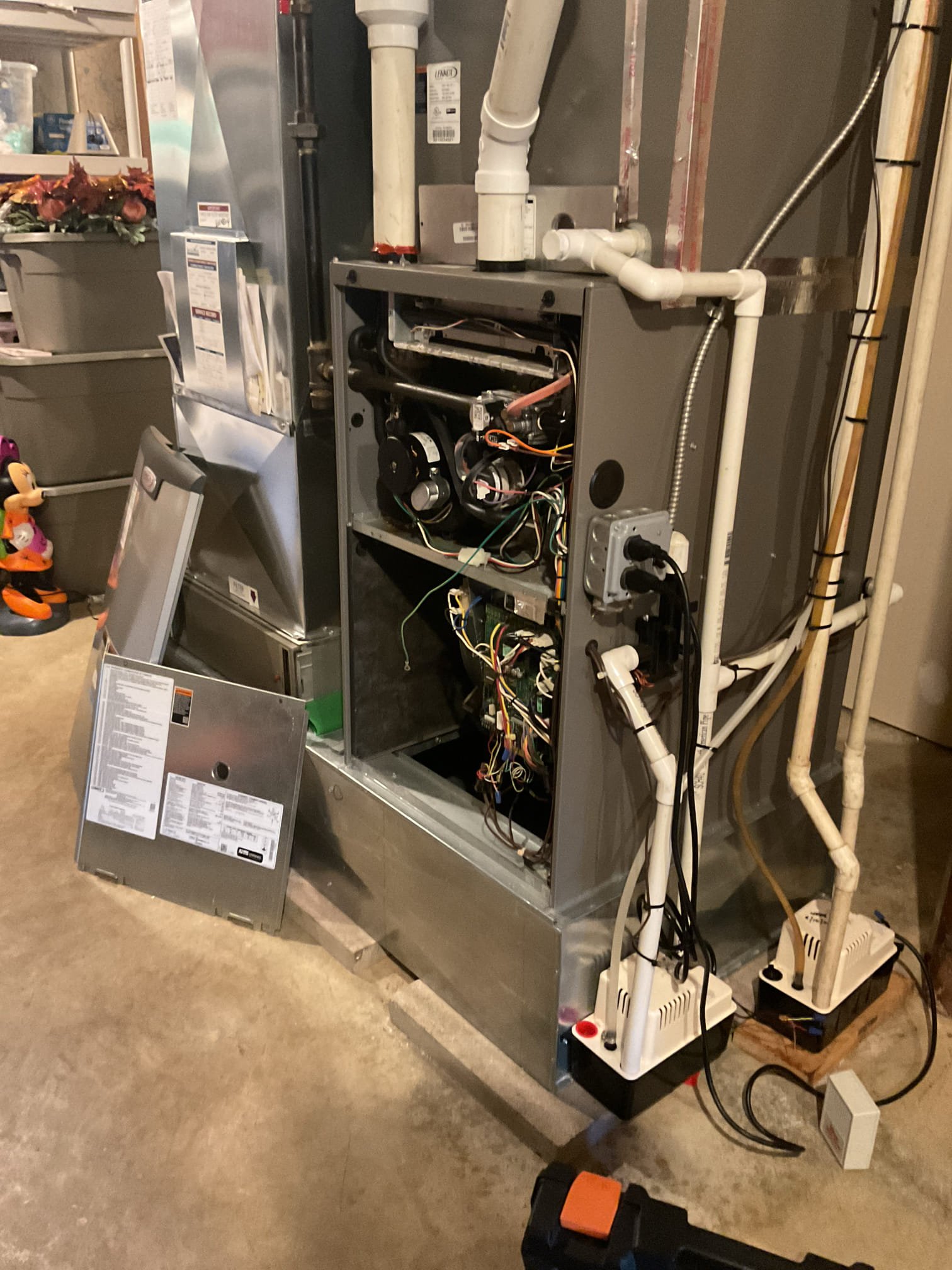 Performed precision heat tune up on (2) Lennox propane gas furnaces. Replaced 20x25x4 air filter for basement furnace, provided by homeowner. 16x25x5 filter homeowner is going to replace. Checked all electrical connections and components. Checked gas pressure. Cleaned flame sensors. Checked resistance of hsi. Inspected heat exchangers with camera.  Found no surge protection on ethier system both have variable speed motors, provided estimate to install. Inspected burners. Provided estimate to replace non working humidifier with Aprilaire 620 humidifier. Performed combustion test. Both furnaces are working at time of service.  Basement furnace is 12 years old would consider replacement. 