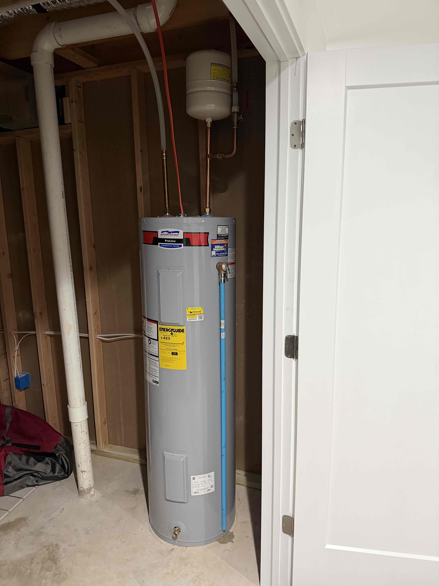 Drained and relocated water heater to corner of the mechanical/storage room. Rerouted piping and electrical to the water heater. Bled out shower and sink. Cleaned up work area and turned water heater back on. 