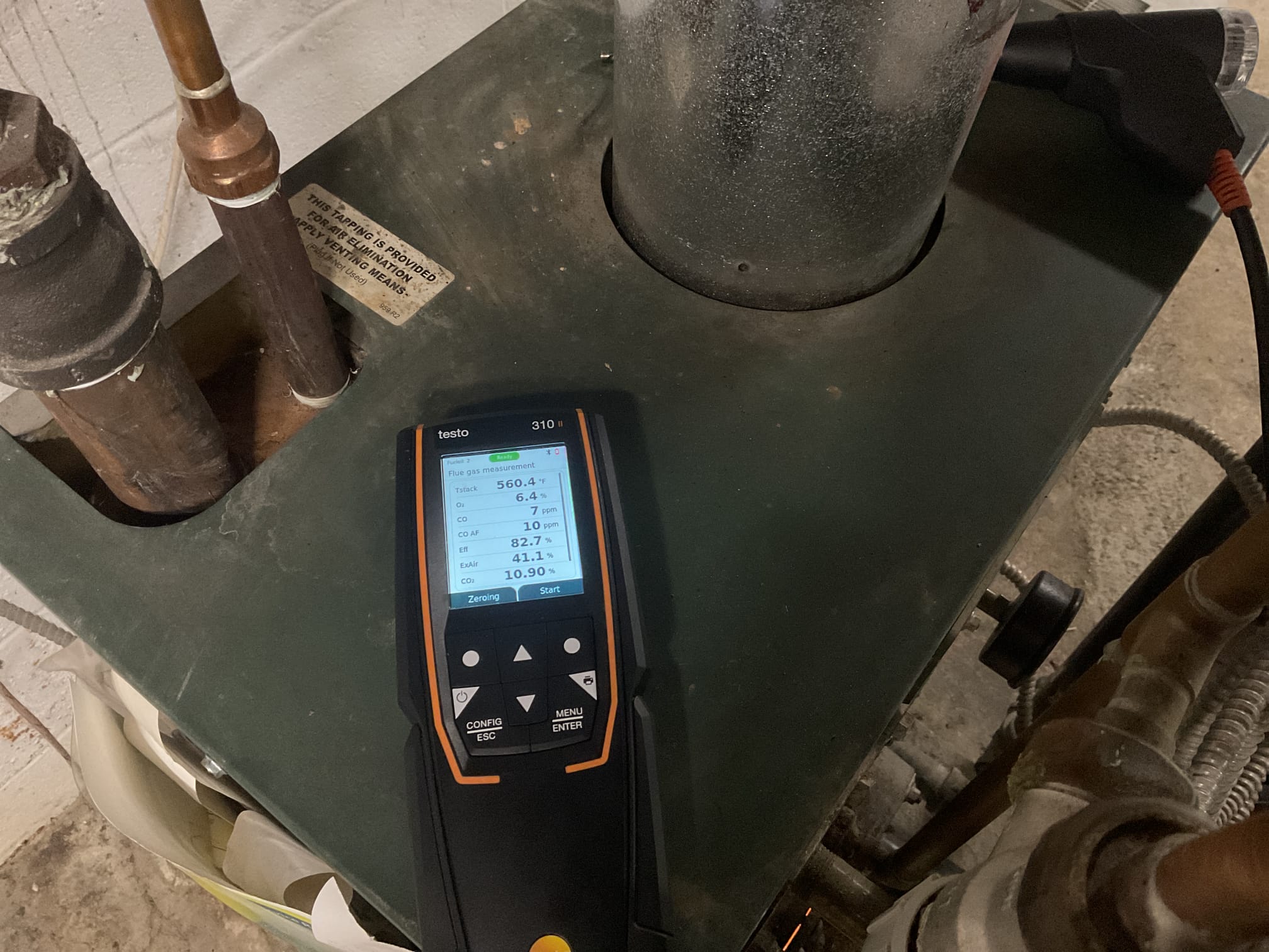 Oil boiler: found oil boiler locked out on hard lockout. Customer ran out of oil and went out and got 10 gallons of diesel fuel. Had air in the line had to bleed oil line to get burner going again. Also explained to homeowner that they need to get more fuel in the tank they are not getting a delivery until Friday. Also there is a chance the the oil filter and nozzle will get all junked up from pulling from the bottom of the tank. Performed combustion test. 

Bosch heat pump installed this summer: went upstairs to ecobee and turned on system. Everything came on but outside unit was shaking due to ice on fan blade got hot water and melted away ice and checked 454b pressure readings on control board. Air filter needs changed is very dirty and could cause a lock out. Heat pump is working at time of service. No problem with heat pump system. 