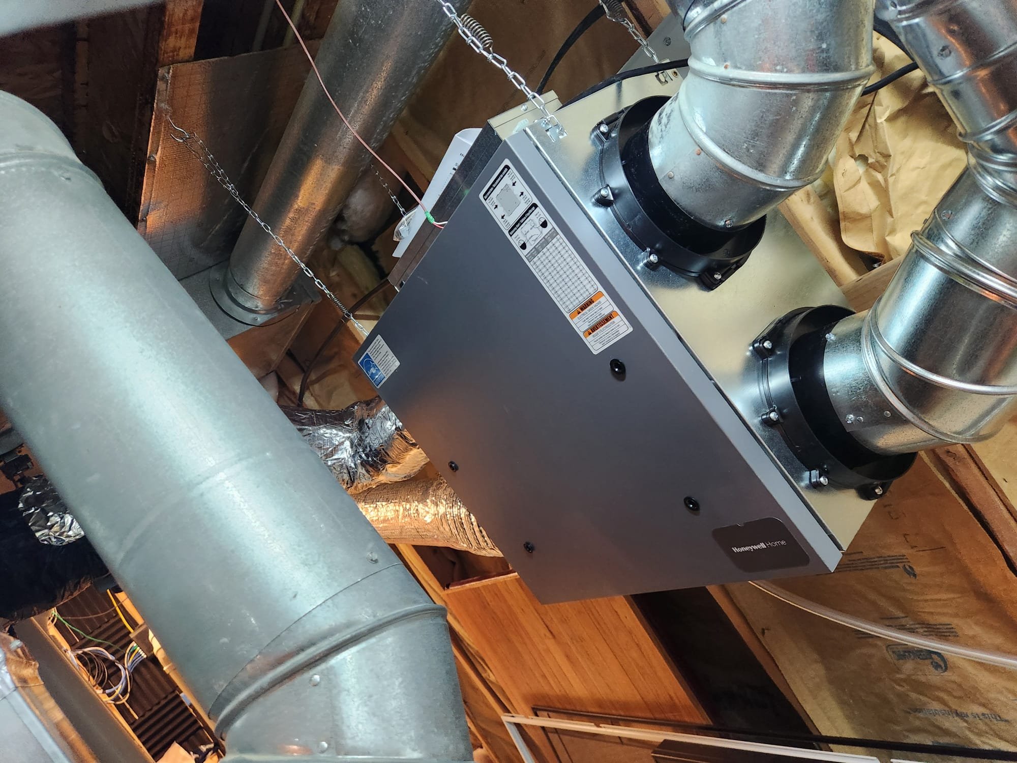 

*Removed old ERV and disposed
*Mounted and installed new Honeywell ERV 150CFM model
*Completed ducting connections.
*Made all electrical connections 
*Tested operation