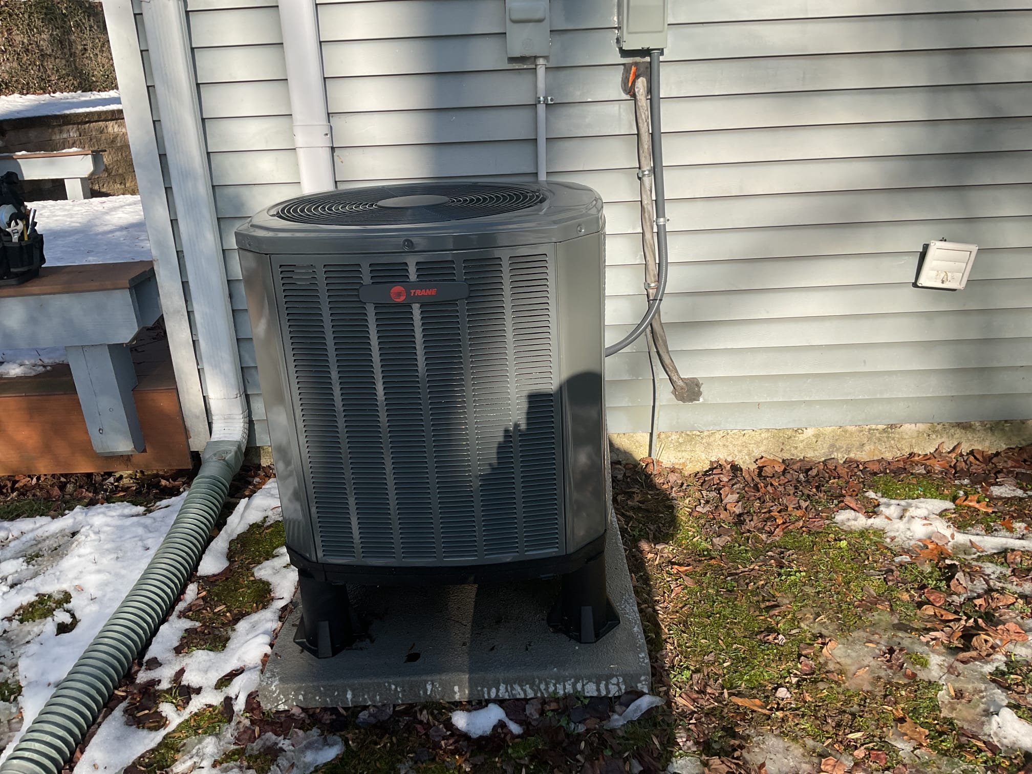 Fully assessed recently installed train heat pump system. Found train system was a block of ice when I arrived. Talked to Joe about screw that it fell in the unit. He had already gotten that out. Tried to put heat pump into test mode to get it to defrost and it did not work. Check resistance on outdoor ambient sensor and it read open line. Tried another a 10 K home outdoor ambient sensor for a different type of system and still was not able to get it to defrost. Will need to order defrost board and coil and outdoor ambient sensor under warranty. Put system in AC mode while I was on site and defrosted outdoor coil. heat pump is working for now but will continue to freeze up. Told Joe to keep the thermostat low until part is replaced. Ice was over an inch thick. No damage to system. Heat pump is working at time of service. 