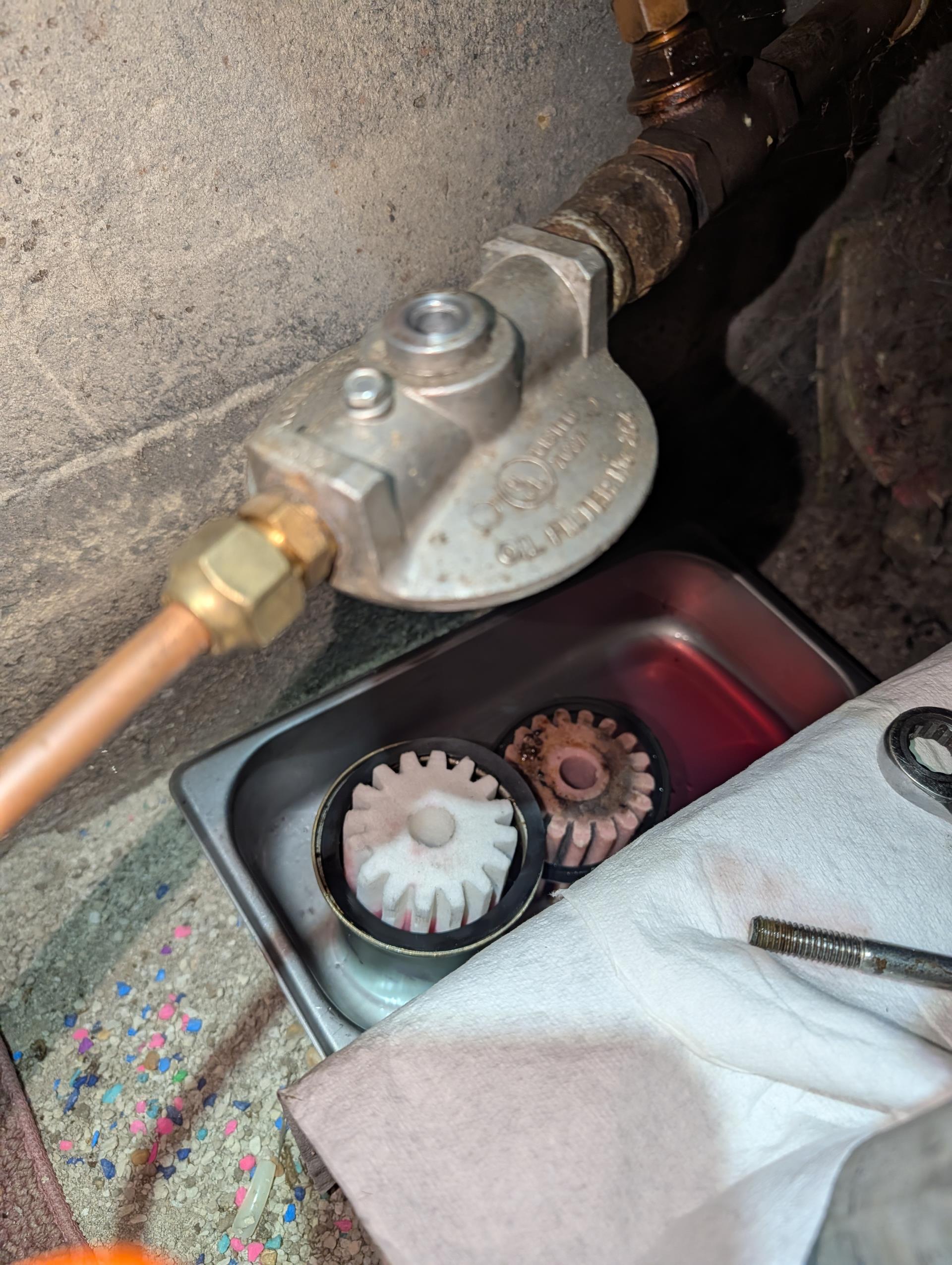 Completed heat tune up for Carrier oil furnace.
Installed 10/3/2012
AC installed in 2020

Replaced 16x25x1 filter 
Cleaned and inspected heat exchanger, flue piping, and chimney breech. Very little soot to speak of.
Replaced oil filter, strainer and nozzle (.65 70s)
Inspected electrodes, cad cell eye, primary control, pump and pump pressure, solenoid and burner chamber. *Verified electrode alignment. Used contractor tool to change post run time from 0 to 30 seconds. 
Bled oil line and completed tests.
Smoke draft and combustion tests: Pass

This system also has open return. Returns should be ducted from the living space to the equipment. 
Oil tank is old

Oil furnace operating well at this time. 