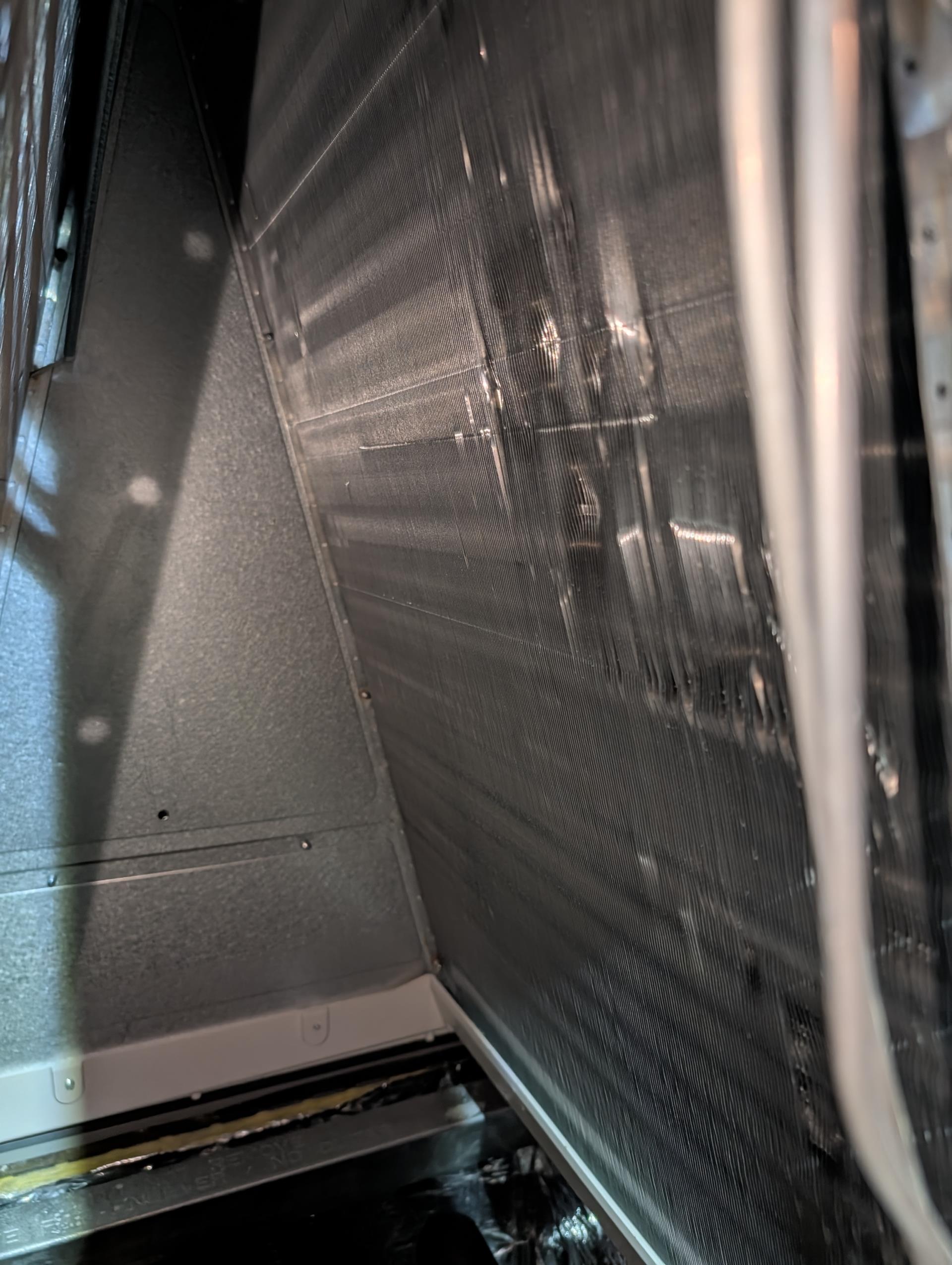 Took apart indoor coil including the front A plate. 
Cleaned with evaporator coil cleaner. Then rinsed with water.
Then sprayed with BioFriesh antifungal spray. All surfaces front, back, inside, outside of coil, a plates and u bends. Also cleaned drain pan. 

Per instructions I did not wipe biofresh off with rags. Allowed to air dry. Reassembled indoor coil.

Set system to OFF, fan On for 10 min to dry indoor coil.

Set system back to heating before leaving. 



