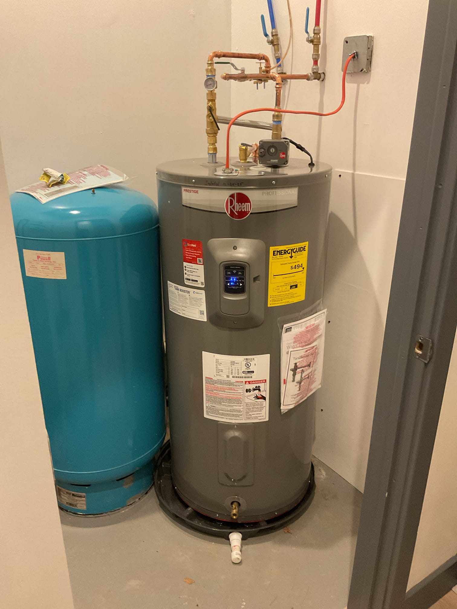 50 Gallon Electric Water heater 12 Year Tank Warranty with leak guard+Tank Booster Rheem.  Tested operations.  Made all necessary piping and electrical connections.  System is running to standards 
