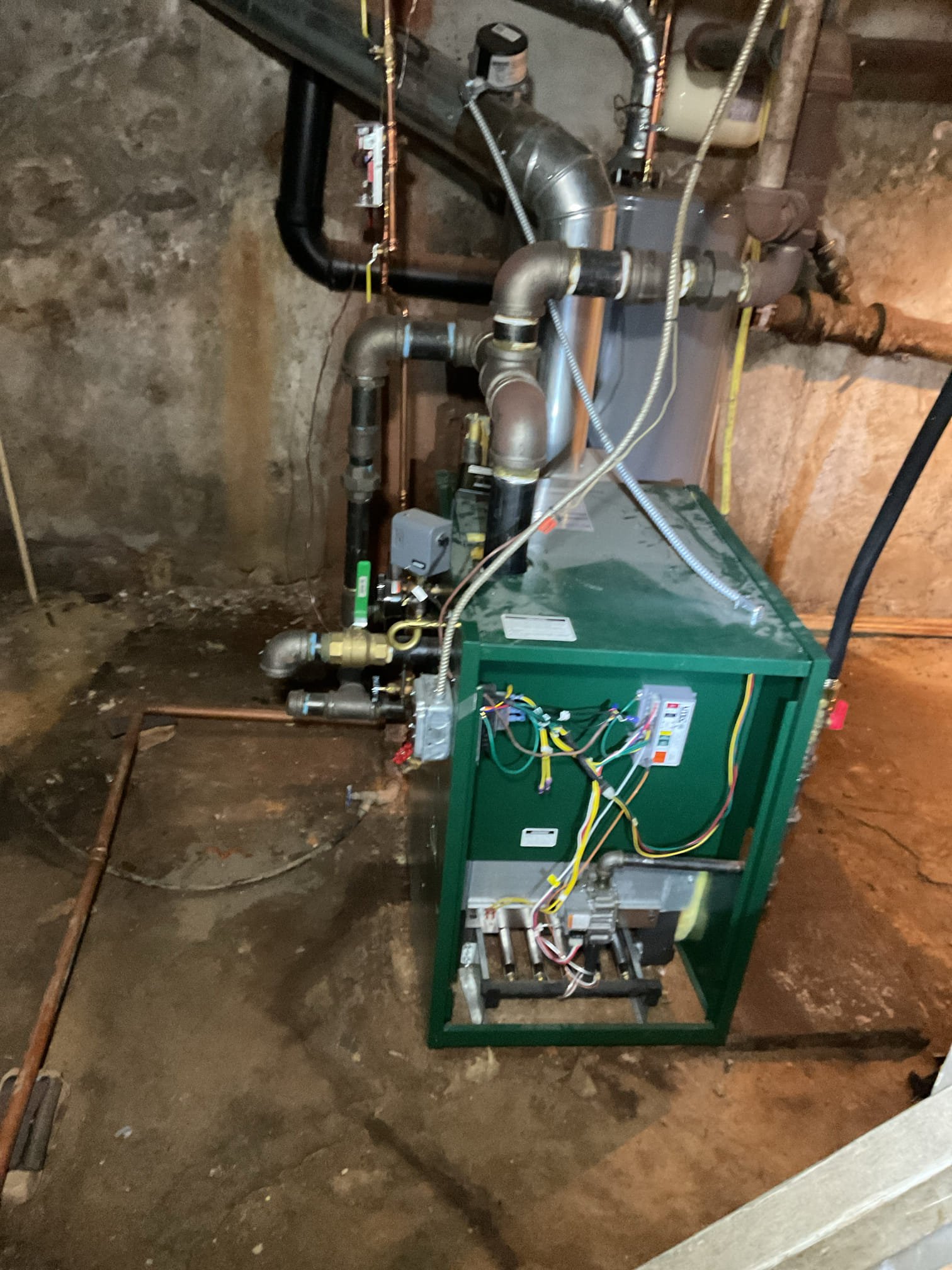 Luis 12-30-25 customer called in for steam boiler not working, found thermostat calling for heat, no operation from boiler, low water is active, found boiler with no water, water feeder was locked out, reset water feeder and test boiler operation, I test low water and feeder, 3 gallon and 2 minutes delay this operation is working properly, I check boiler piping for any leaks. I could not see any leaks (basement piping).
Cycle boiler couple times and boiler came on boiler will some time to heat up. I went to first floor and check radiators, I was able to locate a leak. Leak is under the house. I can’t see exactly where the leak is but I can see steam coming out of the floor. Customer will call plumber to fix this issue. I would also recommend replacing steam vents. 