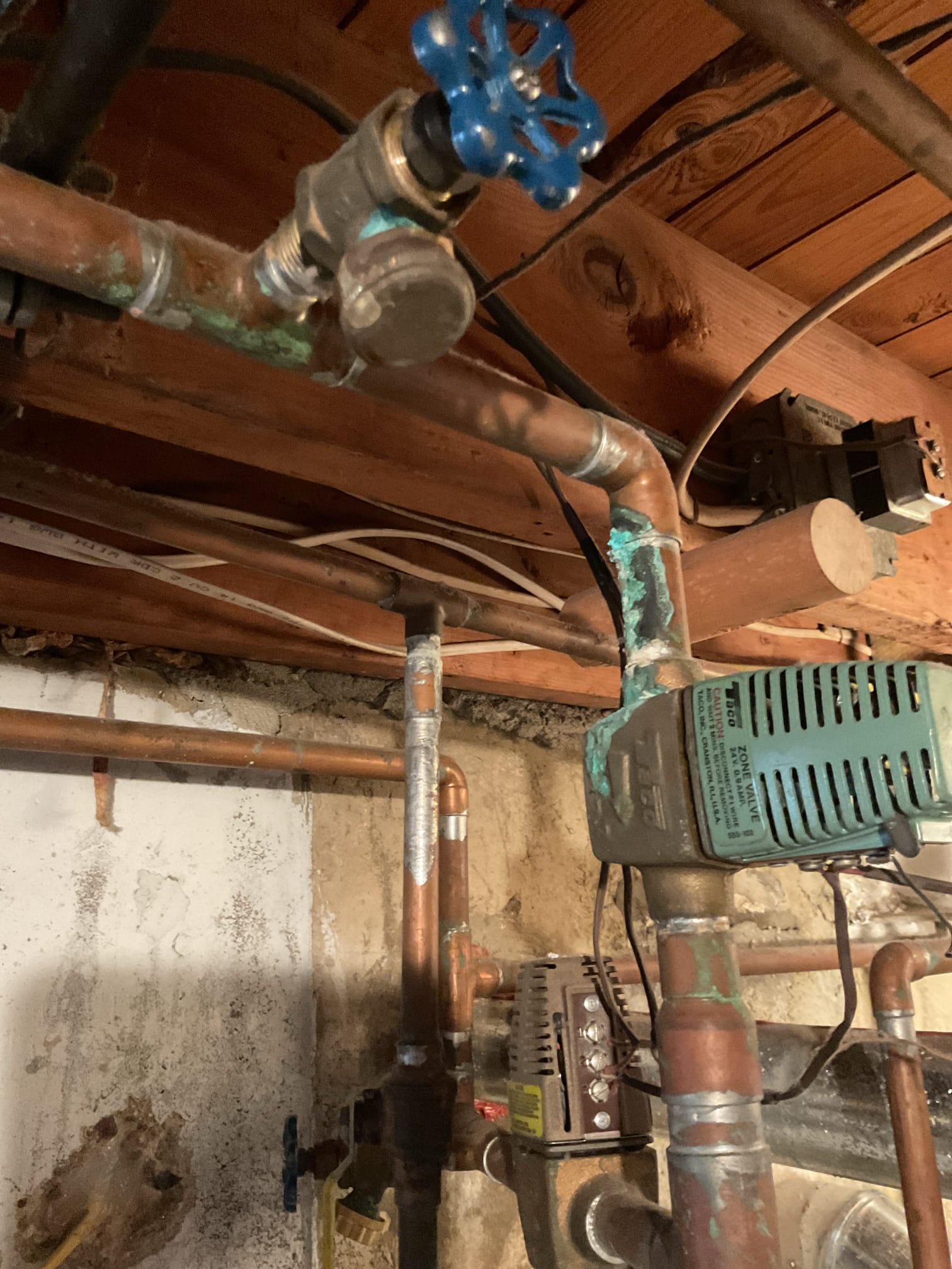 First floor purge tee valve was leaking very slowly.
Was able to get it to stop using wrench on gate valve. I also replaced the cap. No longer leaking.
Had conversation with homeowner about upgrading boiler and the options Joe gave her.
She asked if it was possible if we could replace the (2) purge tees and valves if she goes forward with any boiler upgrade options. I called Joe. He said yes purge tees and valves will be covered as well as a new 2nd floor taco zone valve because the piping near it is is bad shape. 
Please include (1) taco zone valve with boiler materials for install. 

*I used Weil McClain CP number lookup to try to determine age of boiler this number predates the current chart so boiler is older than 1988. 

She paid balance over phone with Melissa for the previous appointment. 
Today I charged diagnostic only.

She is leaning towards going with Laars combi boiler. She will call Joe later. 