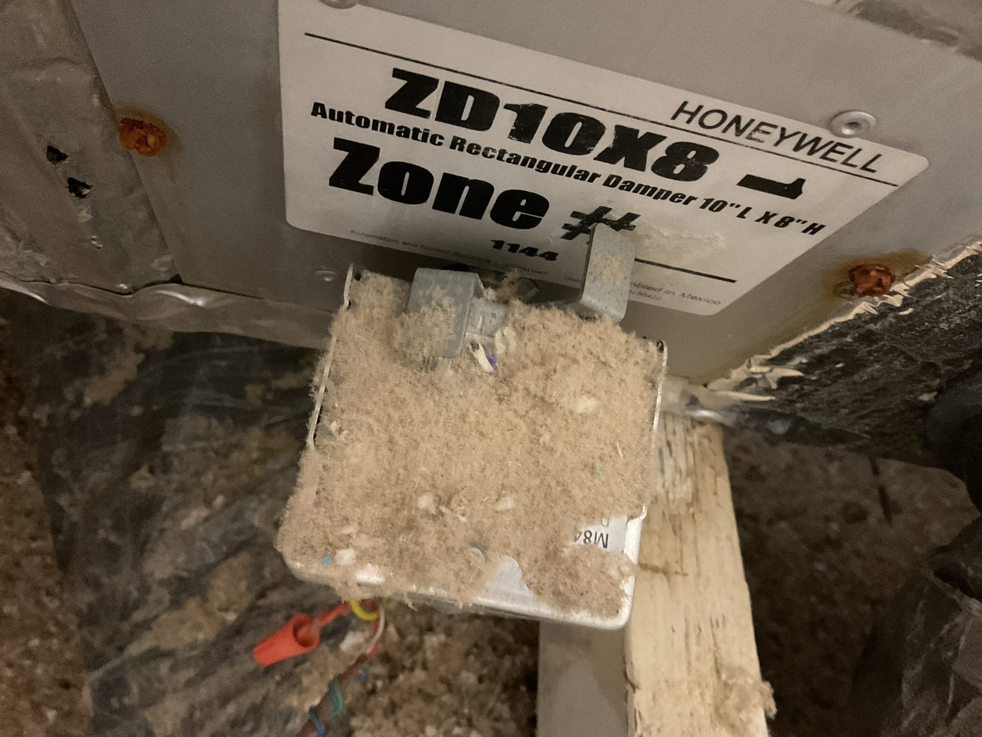 Fully assessed no heating situation. When I first arrived, came out to the outdoor unit and found it running. Pressures were 348/87 410a very good. Temperature rise was 28°. Checked zoning in attic. Found downstairs zone for basement apartment calling for heat but zone damper was stuck shut forced open. Recommended replacing both zone damper which are older style. (1) zd 18x8, (1) zd10x8. Call distributor for pricing and availability. 
Oked pricing with homeowner, need to schedule a time to install. Ordered dampers. System is heating at time of service. Attic is small.  