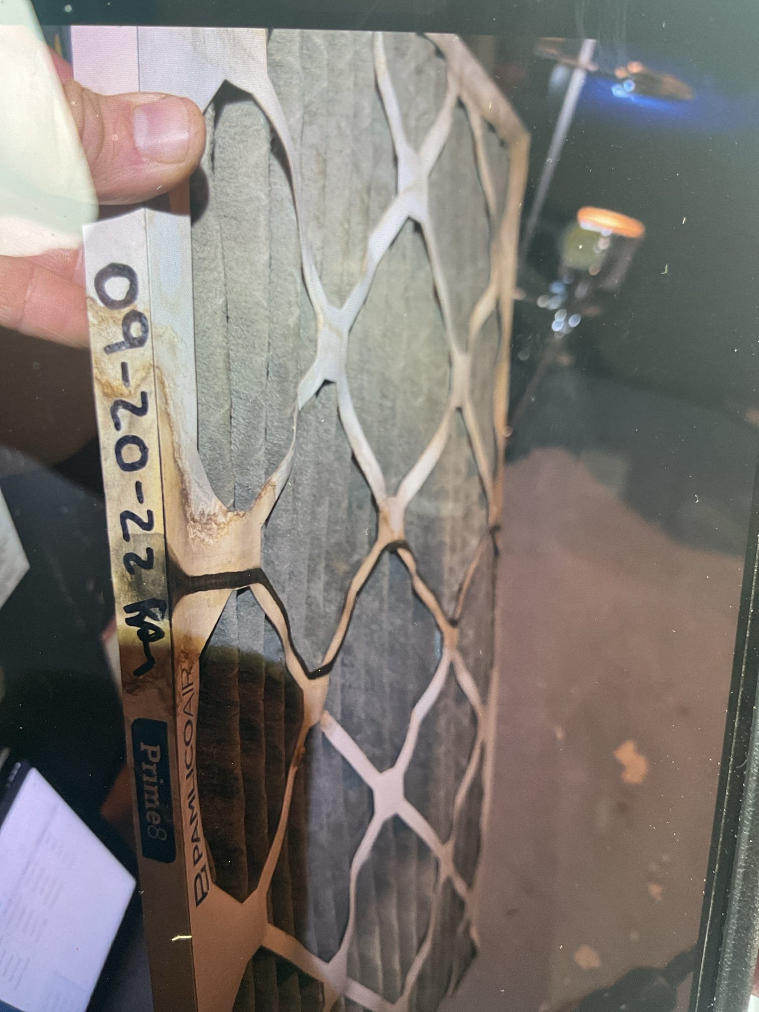 Propane furnace Goodman  dating to 2006-2007 as is the AC (5 Ton)

Found system locked out on resettable rollout switch (left hand side).
Also found a very old filter dated 9/20/22 in the blower compartment along with a more recent filter in filter rack. I removed dirty filter. 
Lots of corrosion on front burner plate.
Also found debris in the port and tubing to the collector box pressure switch rated (-.60”) preventing it from closing. Cleared port and tubing. 
Also cleaned flame sensor. 

Burners in very bad condition. 
Inducer motor bearings very noisy. Ignitor has hot spots.

Combustion test passed. parts per million carbon monoxide peaked at 88 parts per million then gradually decreased back to 64 ppm after 12 min run time.
Smoke test also pass but because of corrosion on burner plate immediately in front of burner the shape of flame is not ideal and this is likely the cause of the rollout switch opening. 

Condensate water from secondary heat changer very dark in color.

Made 2 E