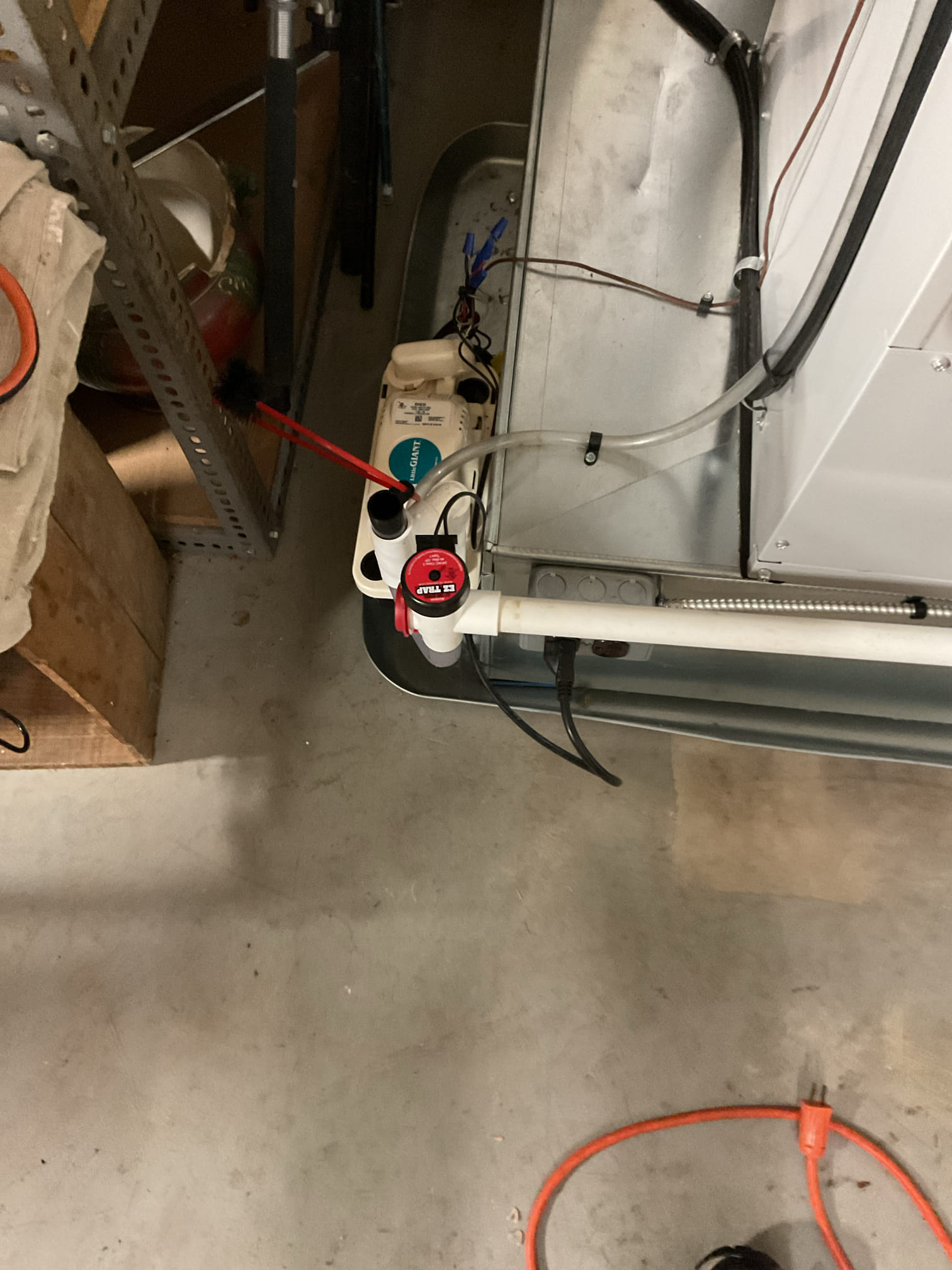 I Arrived to the customers home for a heat pump check up on a 1 yr old system . I checked all electrical connections and voltages . I checked the air filter and replaced, filter size is 18x24x1 . Inspected the indoor coil and tested electric heat package. Took temp splits for the electric heat and blower motor amperage draws. I looked at the outdoor heat pump and tested for an outdoor btu output. Inspected the outdoor components and unit pressures. Everything is working fine at this time of service. 

Also looked at the customers oil furnace , they have an oil smell . I found no oil leak or smell either around the unit or in the cabinet. Did find ports and flue pipe was impacted by soot. I got it cleared out and cleaned out. I checked the  combustion and found ok . I did recommend a chimney cleaning to be sure it’s not impacted. If chimney is ok I recommend oil furnace replacement. No charge from recent tune up. 
