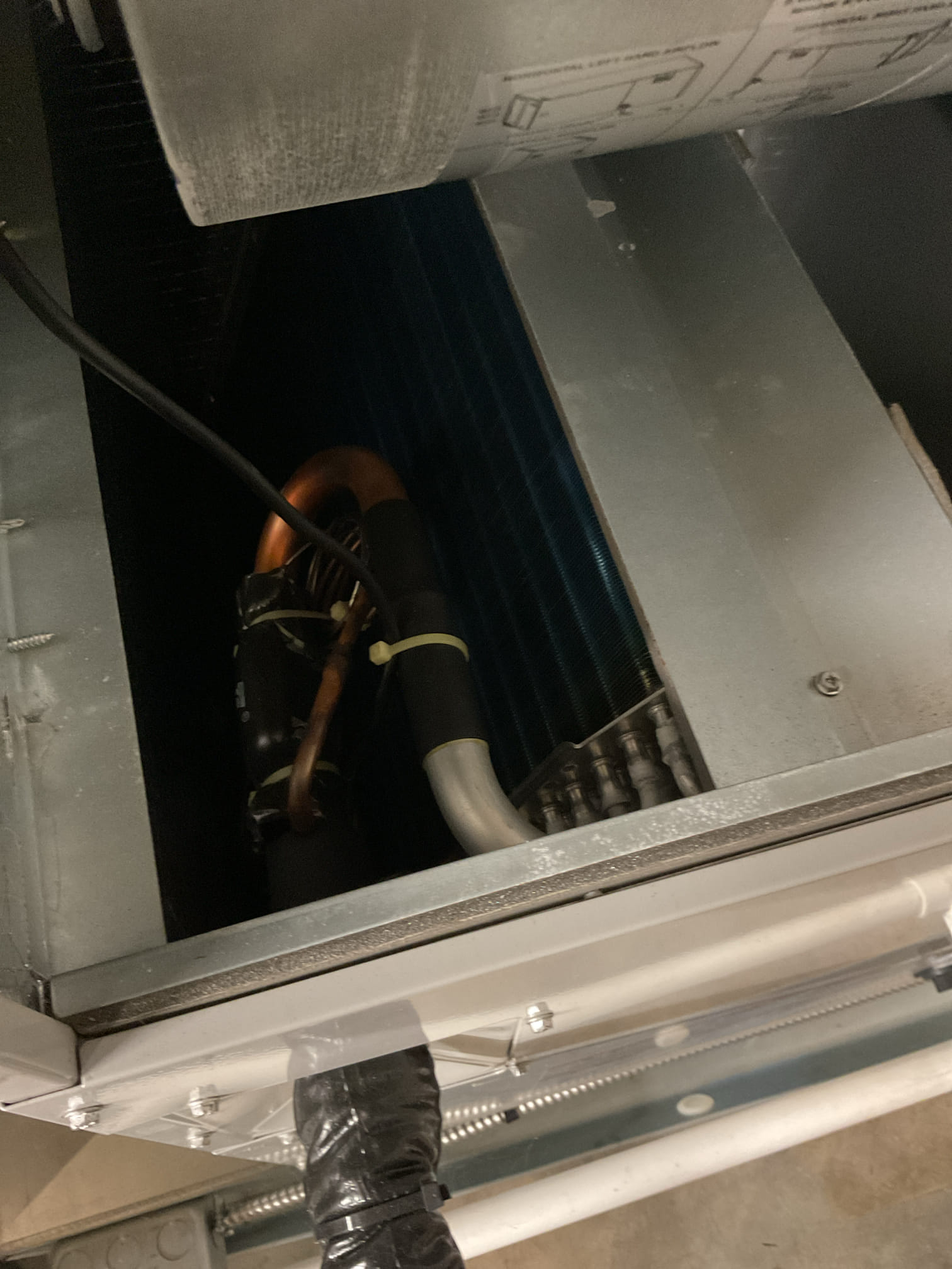 I Arrived to the customers home for a heat pump check up on a 1 yr old system . I checked all electrical connections and voltages . I checked the air filter and replaced, filter size is 18x24x1 . Inspected the indoor coil and tested electric heat package. Took temp splits for the electric heat and blower motor amperage draws. I looked at the outdoor heat pump and tested for an outdoor btu output. Inspected the outdoor components and unit pressures. Everything is working fine at this time of service. 

Also looked at the customers oil furnace , they have an oil smell . I found no oil leak or smell either around the unit or in the cabinet. Did find ports and flue pipe was impacted by soot. I got it cleared out and cleaned out. I checked the  combustion and found ok . I did recommend a chimney cleaning to be sure it’s not impacted. If chimney is ok I recommend oil furnace replacement. No charge from recent tune up. 
