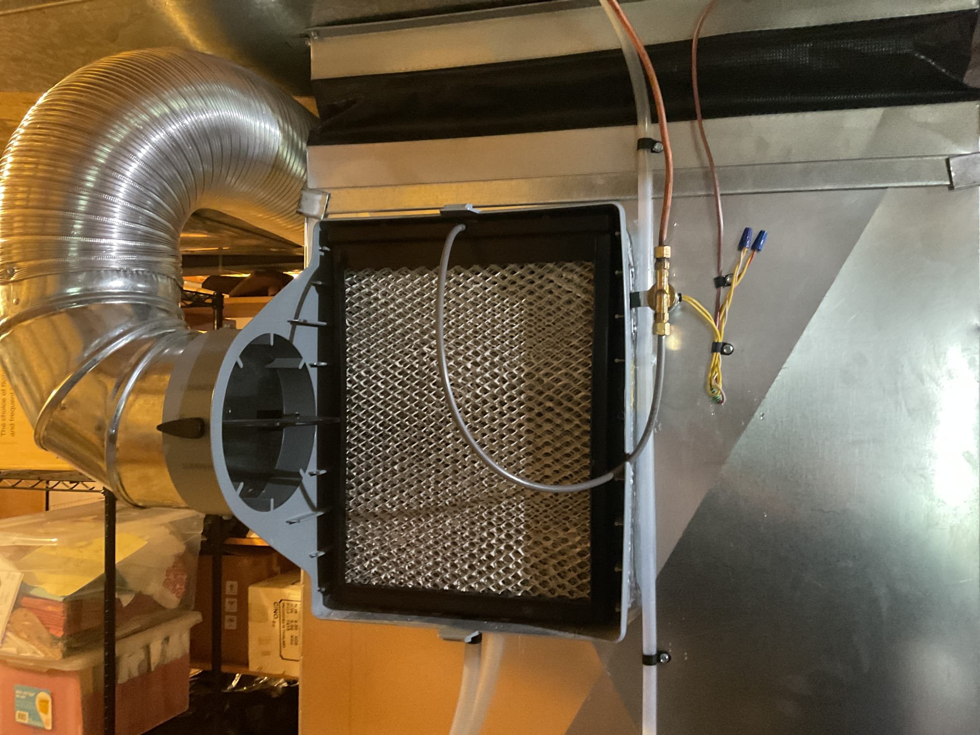 After turning off water to humidifier. Opened up line and found line had a lot of mineral build up. Blew out line with hot water pressure and replaced screen coming into solenoid. Also replaced feeder tube line and humidifier tray and pad. Had full flow to humidifier. Explained to customer that with this set up the only time the humidifier is adding water is when the system is calling for heat. Do not know how well humidity will regulate do to every home is different. Also with these cold temperatures humidity is also very low. Humidifier is operating correctly at time of service. 

