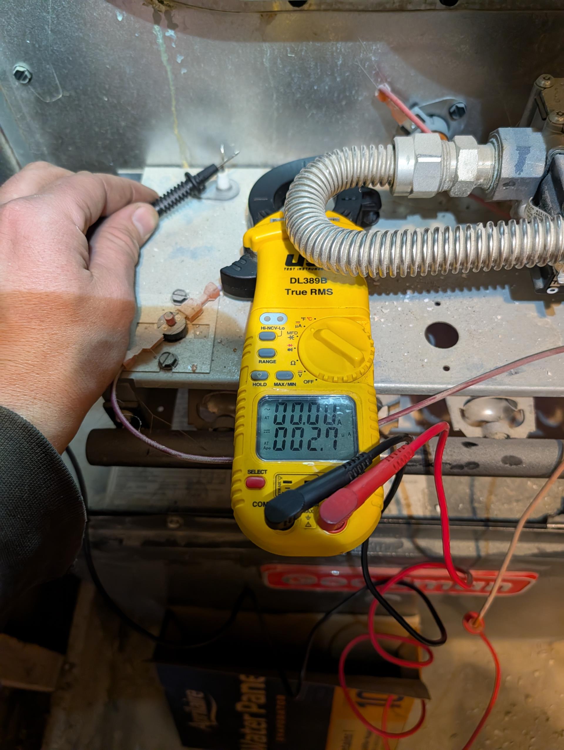 Since their issue started they called a family member who talked them through cleaning the flame sensor. Since then furnace has been operating well.
Verified flame rectification circuit. 3.3uA DC Good
Combustion test Pass

Technically the gas line section that is inside the furnace needs to be hard piped. Provided mail estimate to re pipe section of gas line in furnace compartment. 
Humidifier needed maintenance. Homeowner agreed: replaced #10 panel, cleaned housing, set water flow from feed valve, set humidistat to 35%, opened bypass damper.

Completed heat tune up for natural gas furnace.

20x20x1 filter ok
Inspected heat exchanger, burners, flue pipe, inducer assembly and hoses
Inspected hot surface ignitor and verified resistance with meter
Cleaned flame sensor and verified flame rectification circuit
Measured temperature rise and static pressure
Checked wiring, controls, electric motors and components; there are no surge protectors; left estimate for a surge protector for each of 