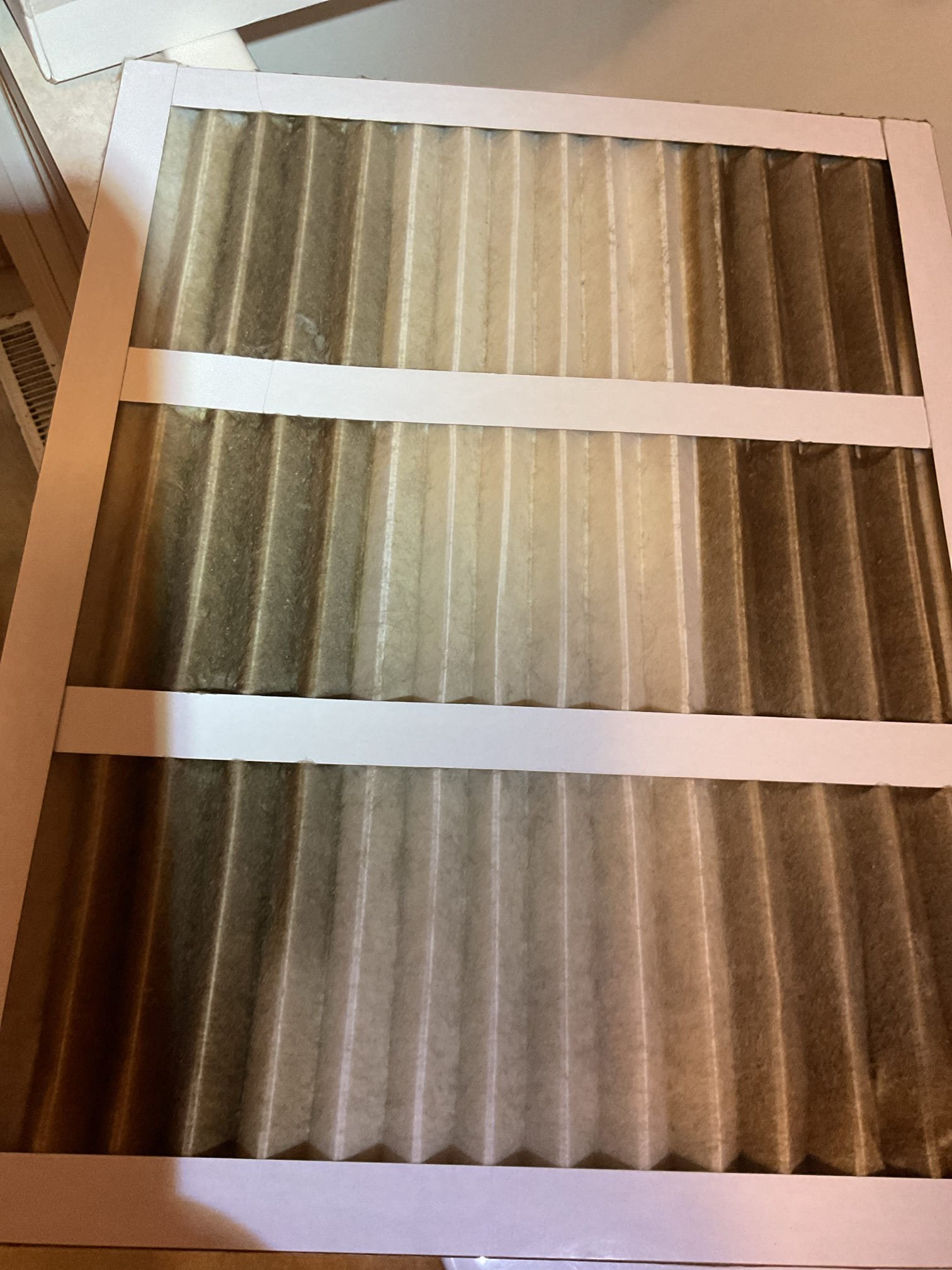 Issue Is it had stopped heating and the blower motor only was running.

I had called her a few hours before my arrival and told her to reset breakers.

When I arrived thermostat setpoint was satisfied 68°

Found dirty 16x20x1 filter. Replaced today. I explained that with a dirty filter the airflow restriction more than likely caused a limit switch built into the strip heater to open and shut unit off and run the blower motor. I also noticed that a 17x20x1 filter would fit more snuggly in rack and thereby protect the indoor coil from getting dirty a little better. I showed Andrea how to order these filters online.

Completed heat tune up for Electric heat air handler.
Measured amp draw of 15KW heater 60A Good
Measured temperature rise
Inspected electric motors and components. Equipment has surge protection.


System operating well at this time. 
