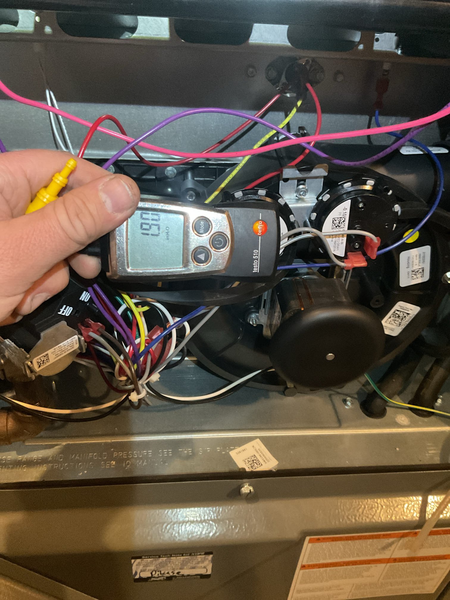 2.5 yr old high efficiency gas furnace off on pressure switch error.  Found pressure switch kit stuck closed.  Cleared tubing and freed up pressure switches.  Tested system operation and cycled several times.  System now operating properly but issue could recur.   Recommend replacing pressure switch kit to avoid future issues.  Ordered part for return visit.  (Part warranty only)

1/6/26
Replaced dual pressure switch.  Tested system.
Verified draft at both pressure switch ports.
Combustion and draft tests: Pass. 
Measured temperature rise.

System operating well at this time,
*This repair includes 2 year part and warranty. 

Collected balance. 

