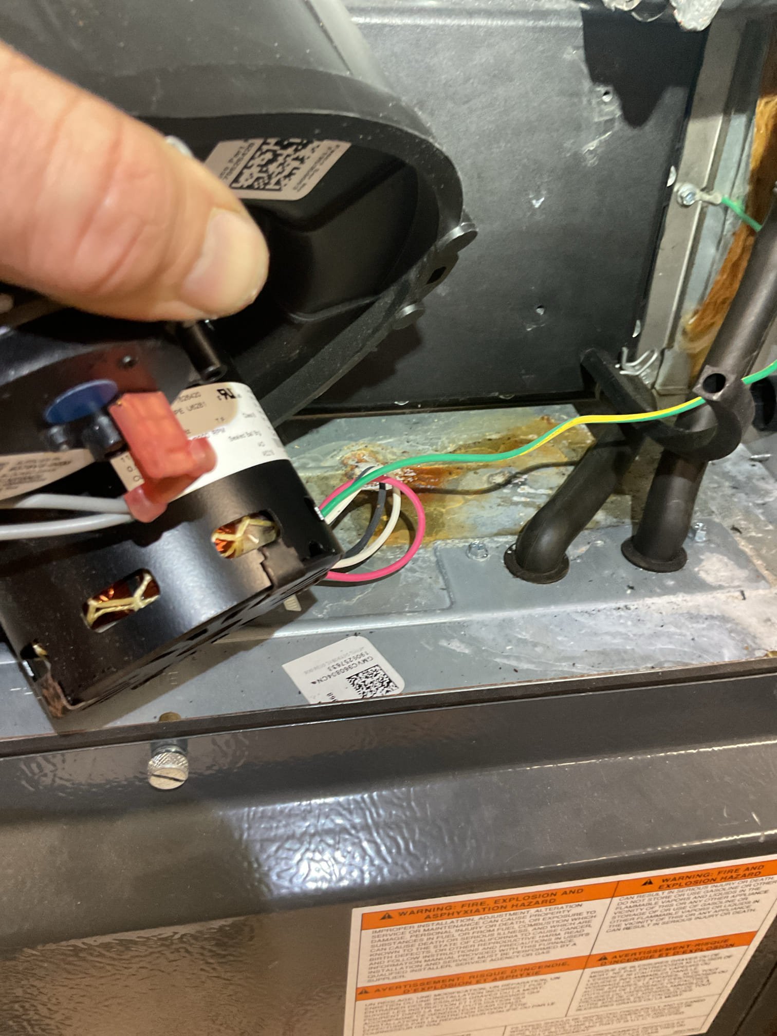 Homeowner described that furnace  would light across but quickly shut off thereafter. 10 seconds or so.
Found dirty flame sensor. Removed and cleaned with fine steel wool.
Tested at 2.1uA DX

Found some after under inducer very minimal. Water is NOT coming from second heat exchanger cover plate, but from the inducer itself. I caulked the seam at bottom of inducer where leak typically occurs. The best way to address this issue is to install a 3” tee with bushing and barb in exhaust that will divert condensation produced in exhaust directly to the condensate pump. 

Reminded Michael that the burners are in bad shape. Recommend upgrading to stainless steel. Emailed estimate again 

Combustion and draft tests: Pass. 

System operating well at this time, 