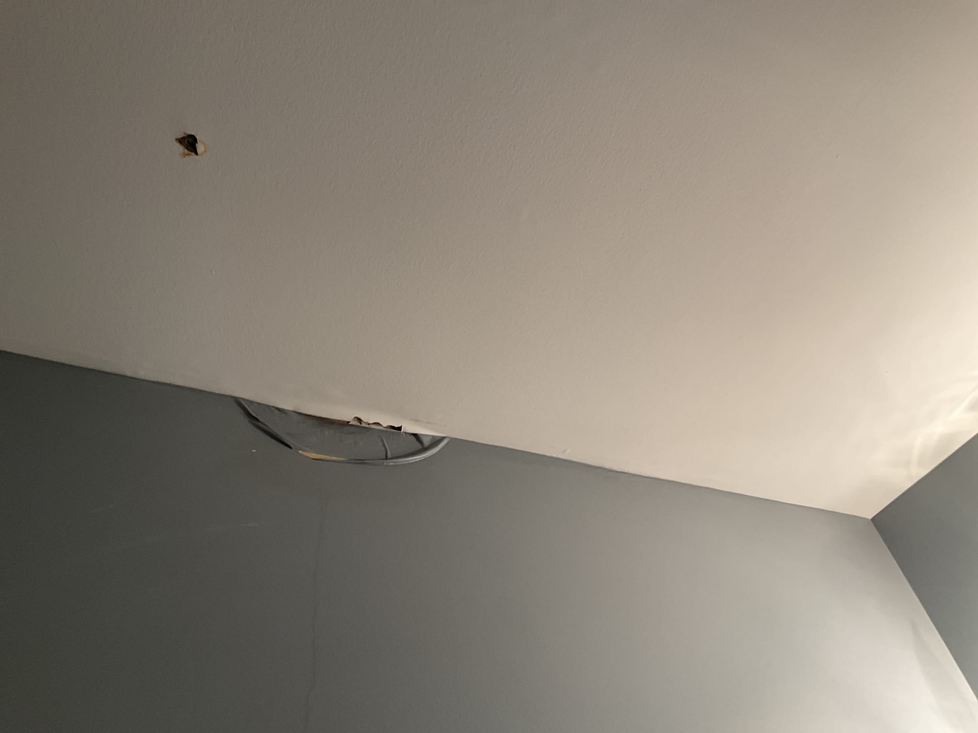 Found that washer emergency drain was clogged in condensation drain line (which was done by another contractor) was clogged. Ran new 3/8” vinyl hose over to 2” trap that goes into the sewer, tested operation. Also cut out 3/4” pvc tee and made emergency drain for washer a dedicated drain line. Test ran condensation pump, all working correctly. A contractor is here to replace drywall in 1st floor bathroom. Also blew out 3/4” clogged line with 400 psi nitrogen, line is open. 