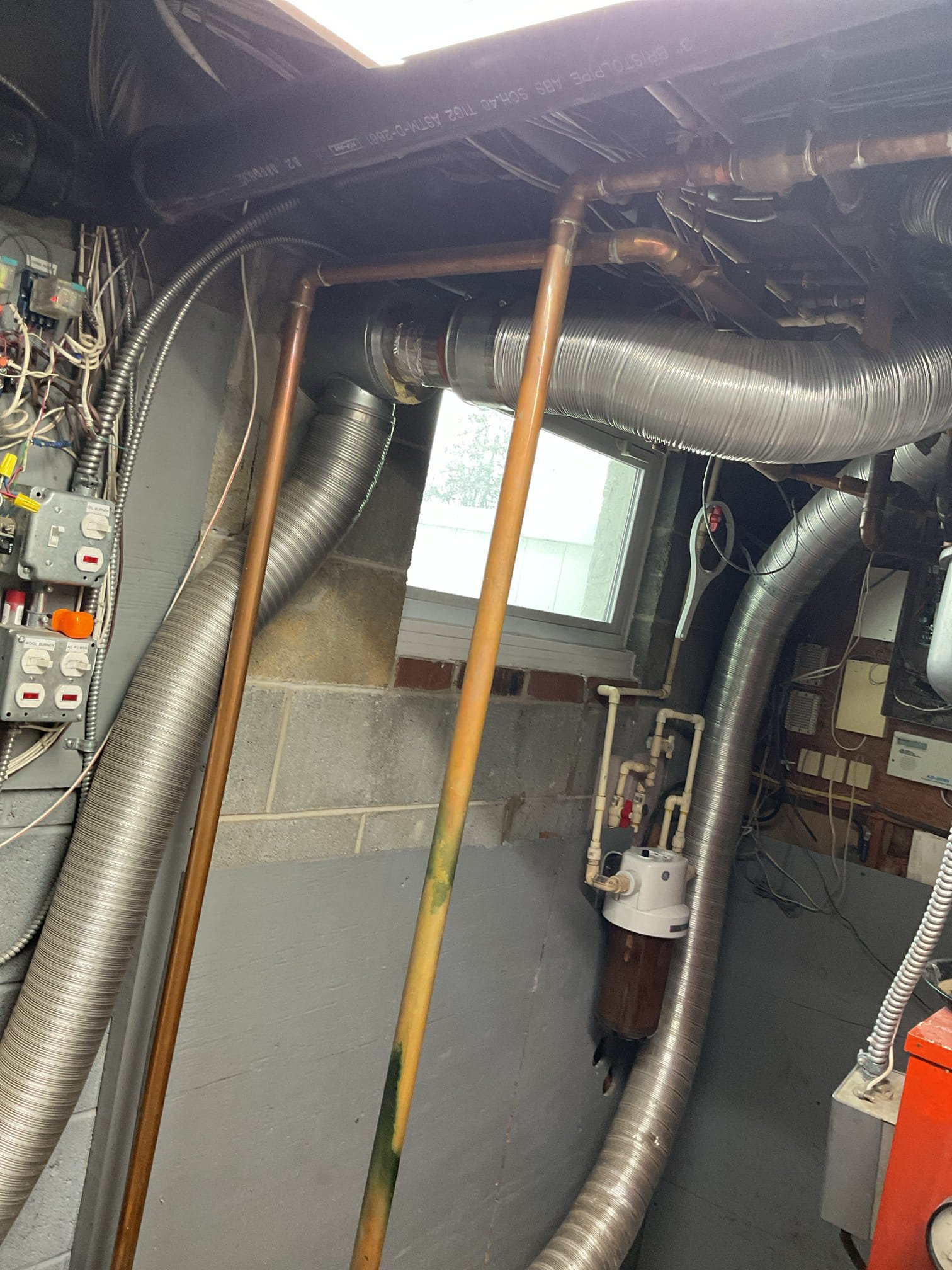 Luis 1-14-26 performed oil boiler tune up on 22 year old crown direct vent oil boiler, and attic Amana heat pump from 2022. 

On boiler side, clean heat exchanger and flue pipe. Replace oil filter rf1 (oil tank and canister are located outside). New stained and new nozzle. Clean electrodes and head. Purge oil line and performed combustion test ok check water pressure and temp ok set to 180 f and 20 psi. Cycle boiler ok. Boiler is working properly at the time of visit. 

On heat pump check indoor unit electrical low and high voltage and connections, inspect air filter ok. Test back up heat ok, check outdoor unit refrigerant levels and pressures ok test defrost cycle heat pump ok heat pump is working properly at the time of visit. 