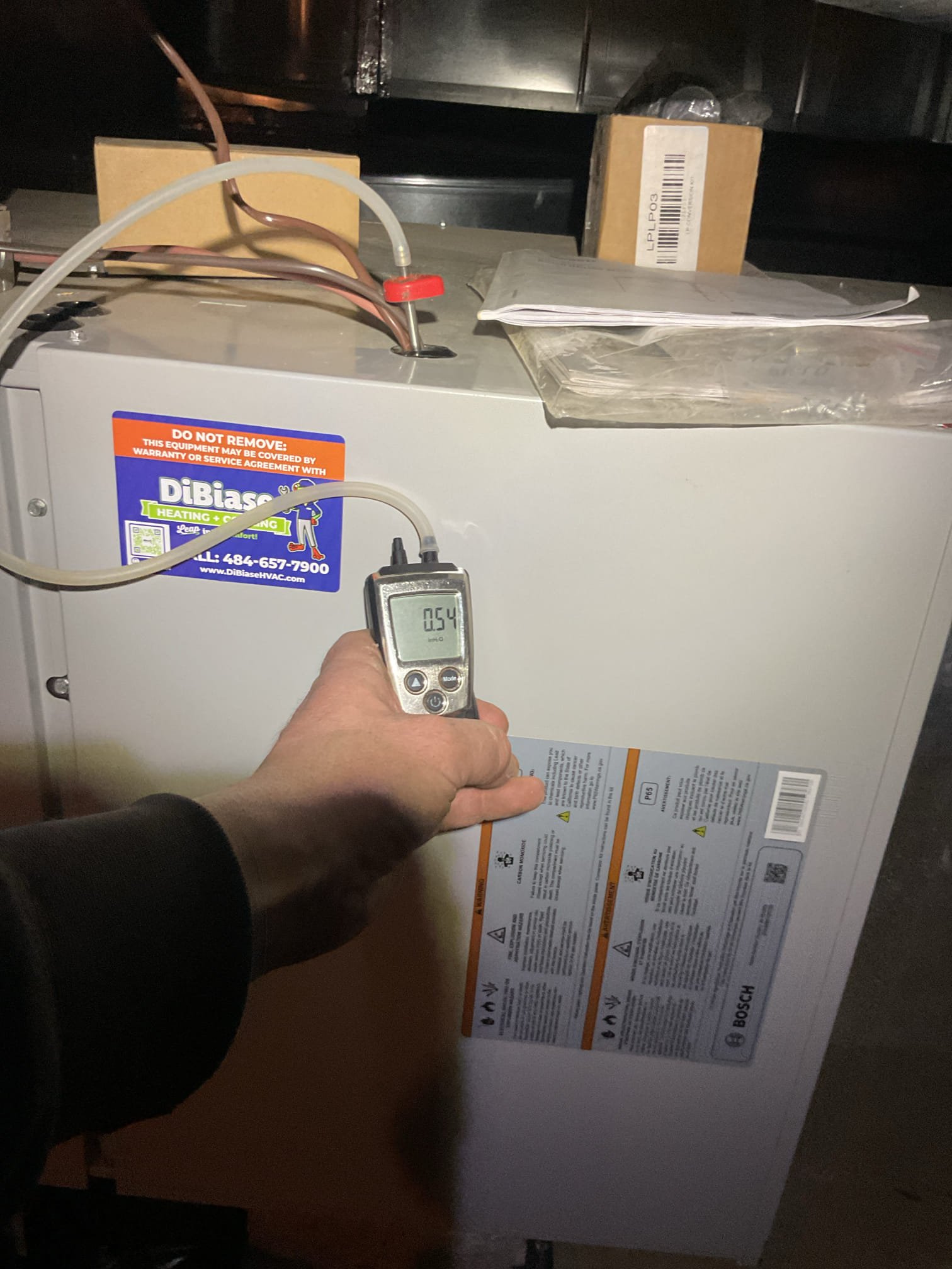 Temperature of first floor when I arrived was 69°F
Scold floor 70°.

1st floor Propane furnace installed June 2024 (in crawl space) was operating when I arrived.
There was 1 error code E5 related to high limit when I arrived.

I replaced 20x20x1 filter and extended blower off delay in heating to 180 seconds. Also bumped up the fam speeds by 1 on gas heating

Verified Location and made sure exhaust pipe was clear of snow. Also cleared heat pump outdoor units of snow. Told them they will have to check this after every snowfall. 

Cycled system several times. No issues observed at all. Also tested the heat pump. No issues or error codes. 
Aux heat lockout 45°F. Compressor lockout 35°

Homeowner mentioned that he would be interested in having a 6/2 wire ran to attic air handler for auxiliary electric heat. 
Took photo of 200A service panel. Panel is maxed out with breakers.

6/2 gauge Wire pull from garage to attic above 2nd floor would be very difficult

