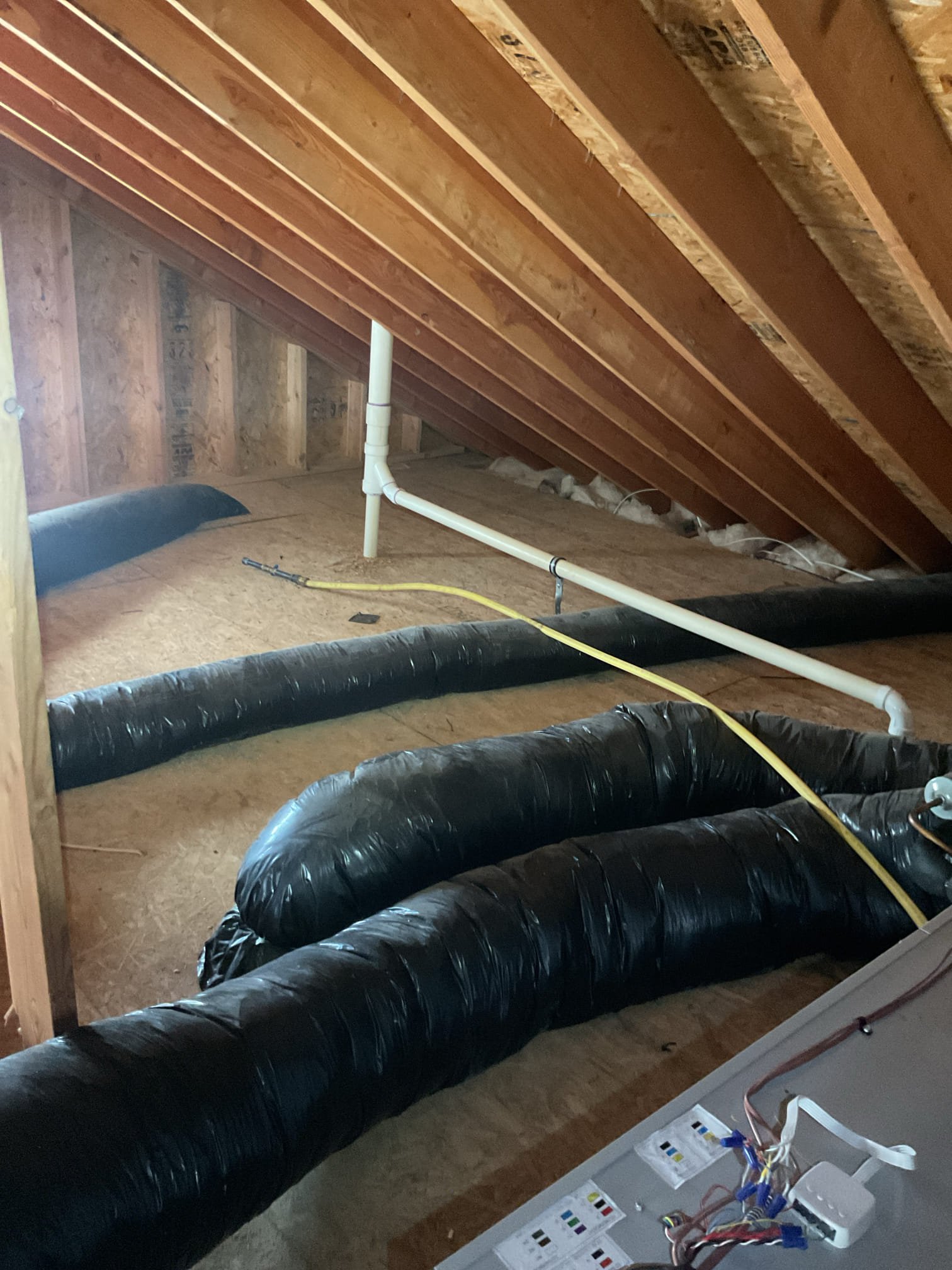 Temperature of first floor when I arrived was 69°F
Scold floor 70°.

1st floor Propane furnace installed June 2024 (in crawl space) was operating when I arrived.
There was 1 error code E5 related to high limit when I arrived.

I replaced 20x20x1 filter and extended blower off delay in heating to 180 seconds. Also bumped up the fam speeds by 1 on gas heating

Verified Location and made sure exhaust pipe was clear of snow. Also cleared heat pump outdoor units of snow. Told them they will have to check this after every snowfall. 

Cycled system several times. No issues observed at all. Also tested the heat pump. No issues or error codes. 
Aux heat lockout 45°F. Compressor lockout 35°

Homeowner mentioned that he would be interested in having a 6/2 wire ran to attic air handler for auxiliary electric heat. 
Took photo of 200A service panel. Panel is maxed out with breakers.

6/2 gauge Wire pull from garage to attic above 2nd floor would be very difficult

