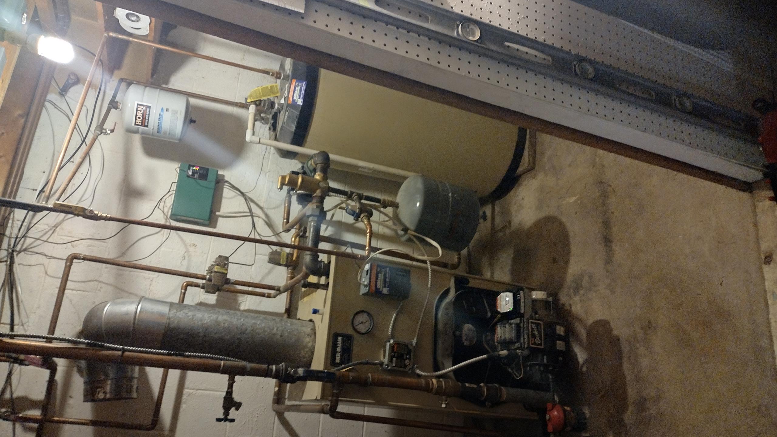 When arriving to the Weil McLain 22 yr old oil fired boiler, I found all three zones were calling for heat.  zone one zone two and zone 4 which is domestic hot water. I checked my Aqua stat and found I have 120 V coming into stat ,  120 volts for the oil burner but nothing out for circulator. I Quoted customer for a new aqua stat , she approved the repair . I Replaced the aqua stat and turned  the system back on . The oil burner tried to fire but cut out and then it would try again. The circulator is working again through the aqua stat and the burner is holding 120 volts. but the burner can’t light off. After further diagnosis we found the primary control failed on the oil burner. I had a primary control on my truck that would replace that failed control. I gave the customer a price for the primary control. She approved that as well. Once the new part was installed we retested the system and made sure all parameters were set correctly. The Boiler is back up and running as normal all zo