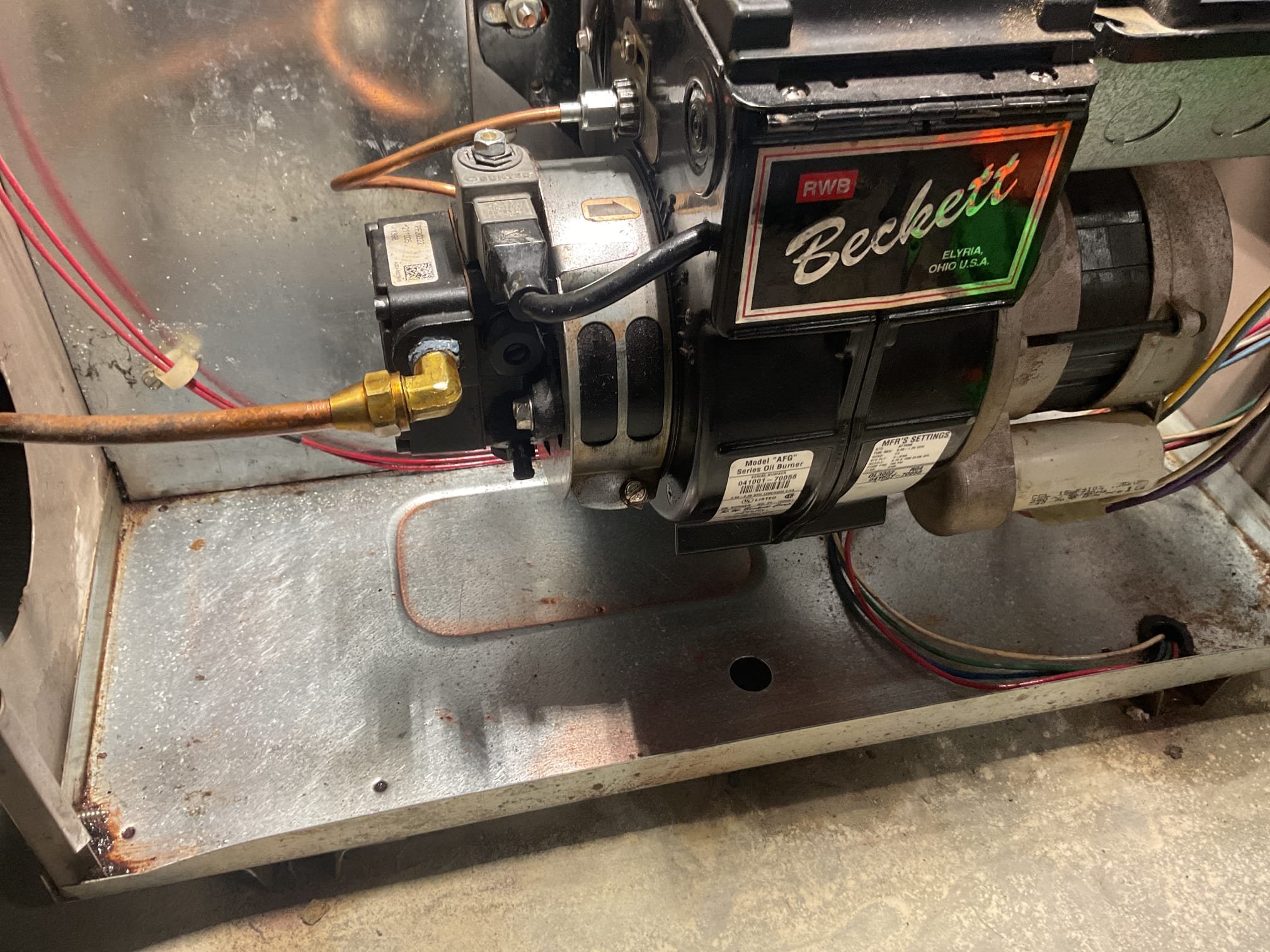 Fully assessed oil leaking situation. Found pump seal had failed on oil pump. Took apart burner and cleaned up oil. Also cleaned up nozzle and electrodes. Installed new fuel pump and tested operation. Performed combustion test. Oil furnace is working properly at this time. Called office to approve cashing check on 1/23/26. 