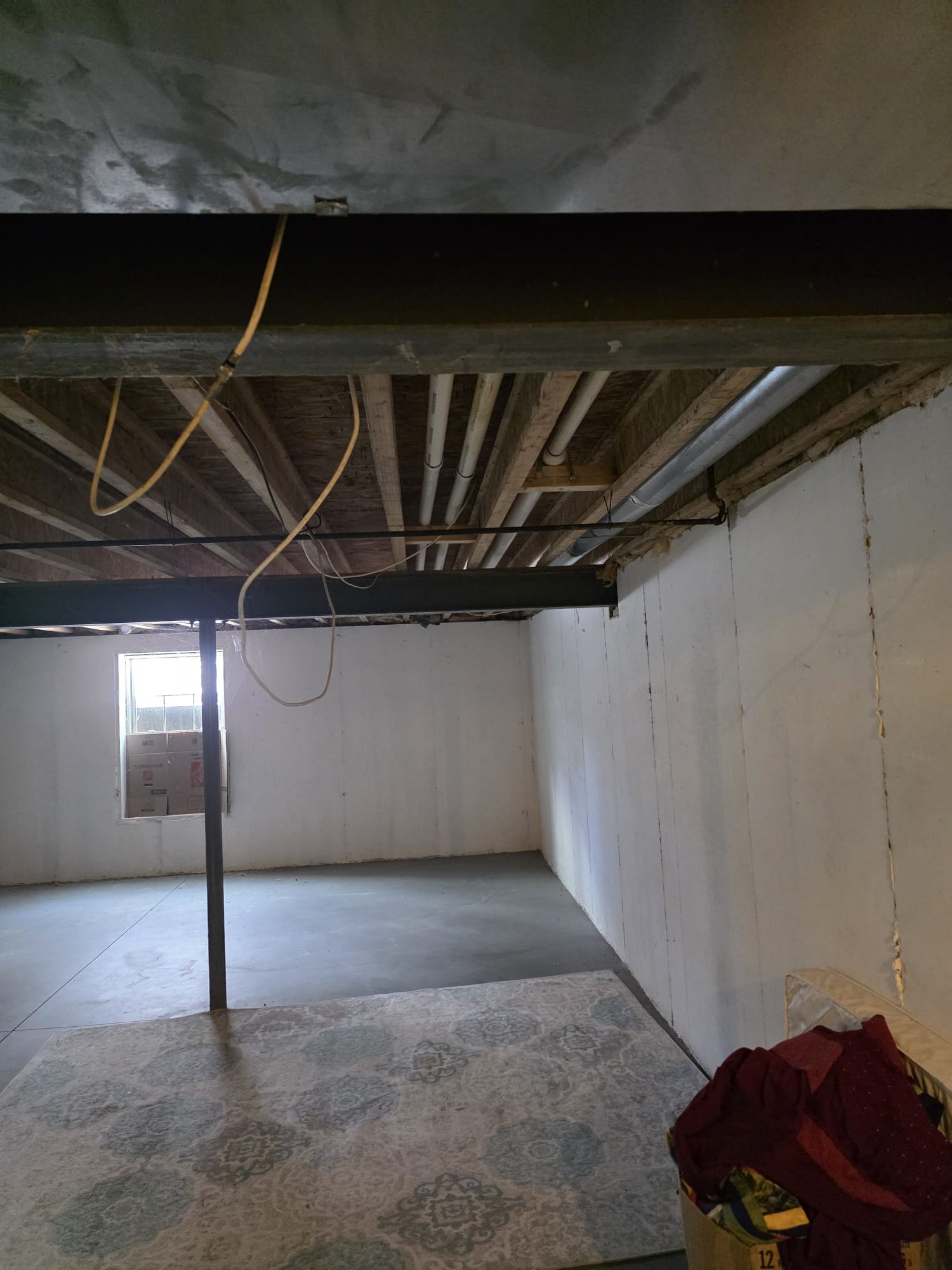 Found furnace running on arrival.  Inspected system errors and found EEO error code ignition. Retry error.  Removed and cleaned burners, found loose ground on burner cabinet - tightened.  Inspected propane and venting systems.  Checked all wiring.  Cleaned flame sensor.  Checked drain switch and other pressure switch and measured pressure at -1.7 compared switch rating at -1.2 inches.  Measured pressure with door on and off.  We did experience an issue at first start, but could not replicate after work was performed.