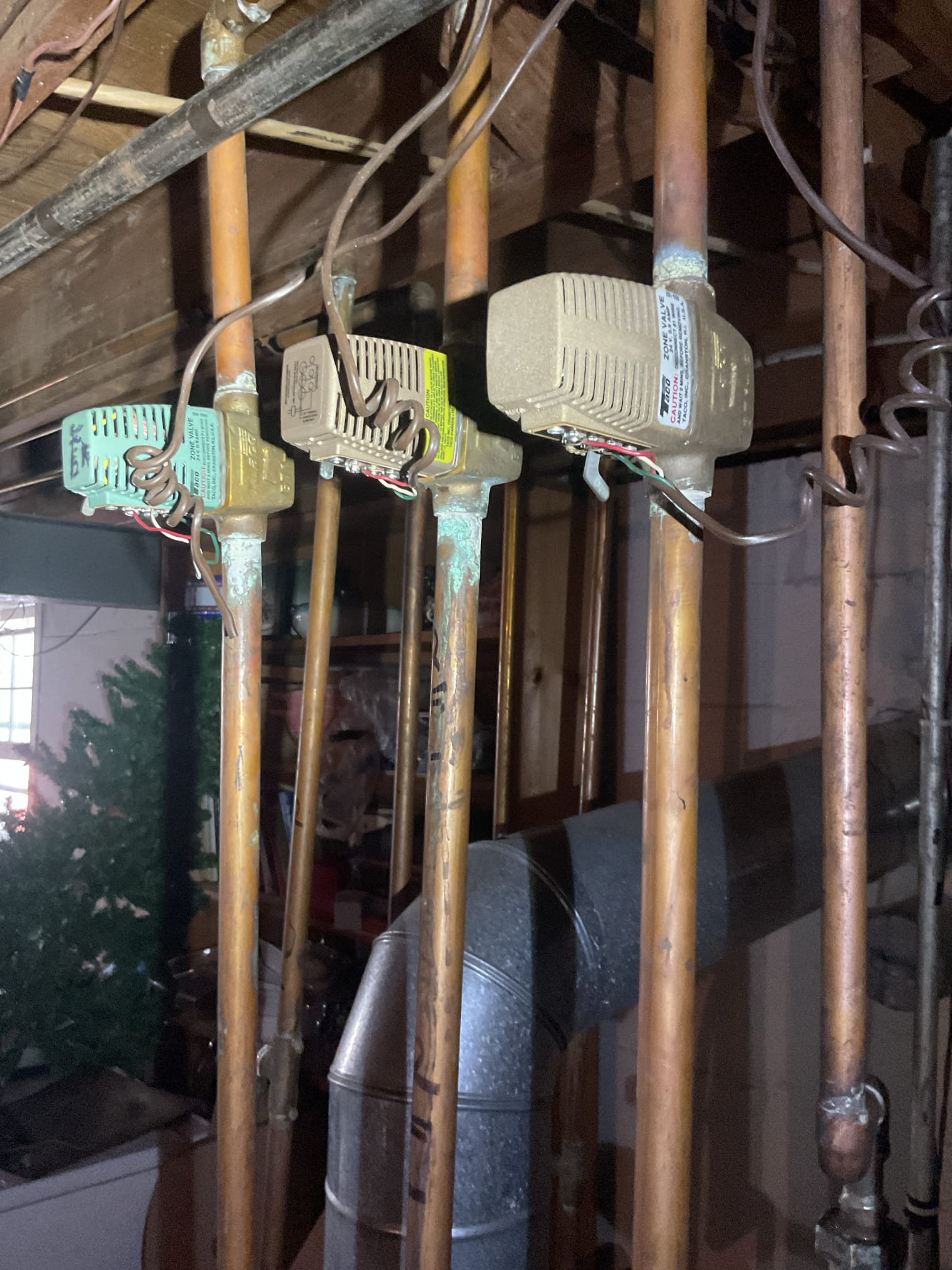 Ultimately determined the dining room zone valve power head has failed. 
The valve body itself thankfully still functional.
Offered to replace this vibe head.
Also recommended purging this zone. There is a blockage in the feed. Had to feed with water heater to purge. It is not the pressure reducing feed give that has failed there is a blockage elsewhere. At the expansion tank fitting possibly. 

There was also a lose and improperly connected low volt wire ant 4x4 box preventing end switch from making. Tightened today. 

Replaced Dining room zone valve head and purged the zone today, 

Air elimination needs to be addressed provided previously recommended estimate for this.
Supply manifold has lots of corrosion. 
There is low water marks under boiler as if it is leaking. That may show itself in the off season
Strongly recommended again replacing the boiler, 

All zones operating well at this time. 

Paid balance today, 

They will call us when they think of a time for a consultation for 