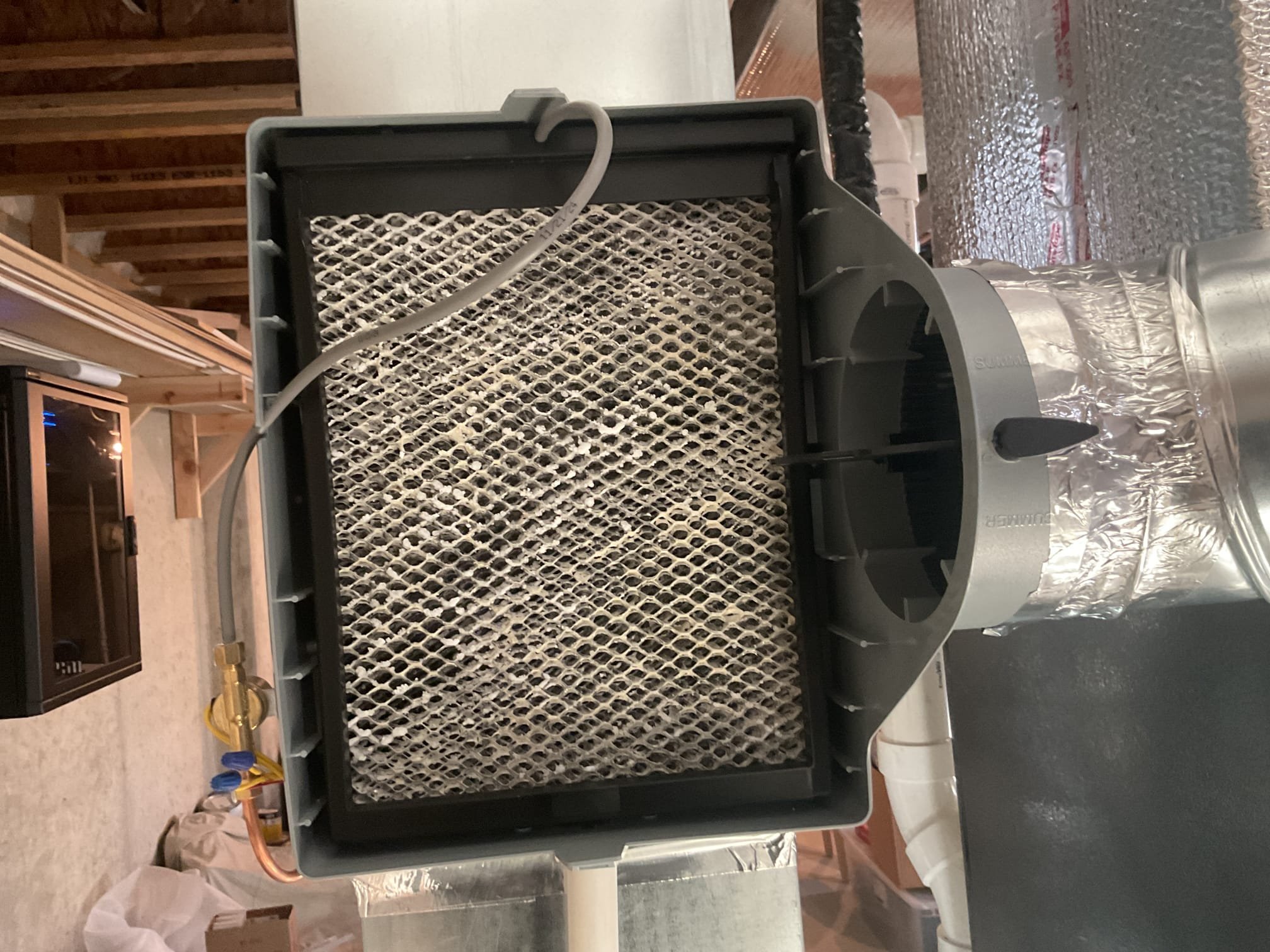 Fully assessed humidifier not humidifying as well as it should. Found winter summer damper not open all the way. Showed Kate how to open all the way. Also found humidifier pad full of calcium and debris and needed serviced anyway. Serviced humidifier with #35 pad and flushed out drain. Tested humidifier operation. Humidifier is working properly at time of service. 