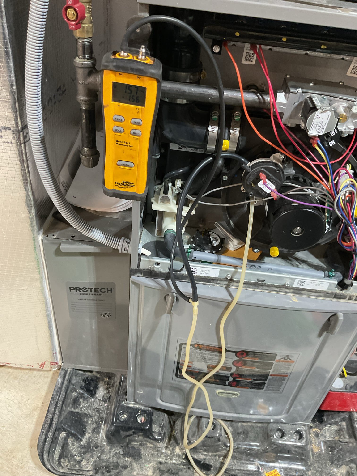 Luis 1-27-26 customer called in for no heat, rheem heater from 2021  customer had issue Uber weekend and tech in call ask him to clear vent and it worked. This morning customer seen pressure switch error and heater not working, test operation heater was working upon arrival check vacuum while unit running ok. Vacuum is higher than the pressure switch rated. I inspect intake found some snow inside piping. I quoted to modified piping customer approved repairs. After repairing venting test heater ok. Cycle heater couple times ok. 