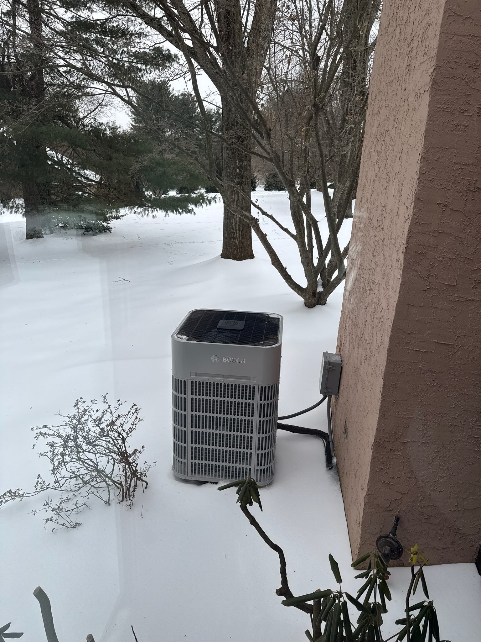 Fully assessed defrost situation. Found thermostat set to 70 degrees when we arrived and calling for heat. Found system was completely defrosted at this time. Looked over install manual for defrost settings. Only two settings could be changed one was to reduce heating run time by 10% turned this dip switch on. Also turned on dip switch to extend defrost by 60 seconds, these are the only settings that can be adjusted. Also checked over all settings in the thermostat from install they were correct. Checked 454b refrigarant pressures on digital read out they were 272/55 very good let homeowner know the changes that were made. No charge due to recent install. Heat pump is working properly at time of service. 