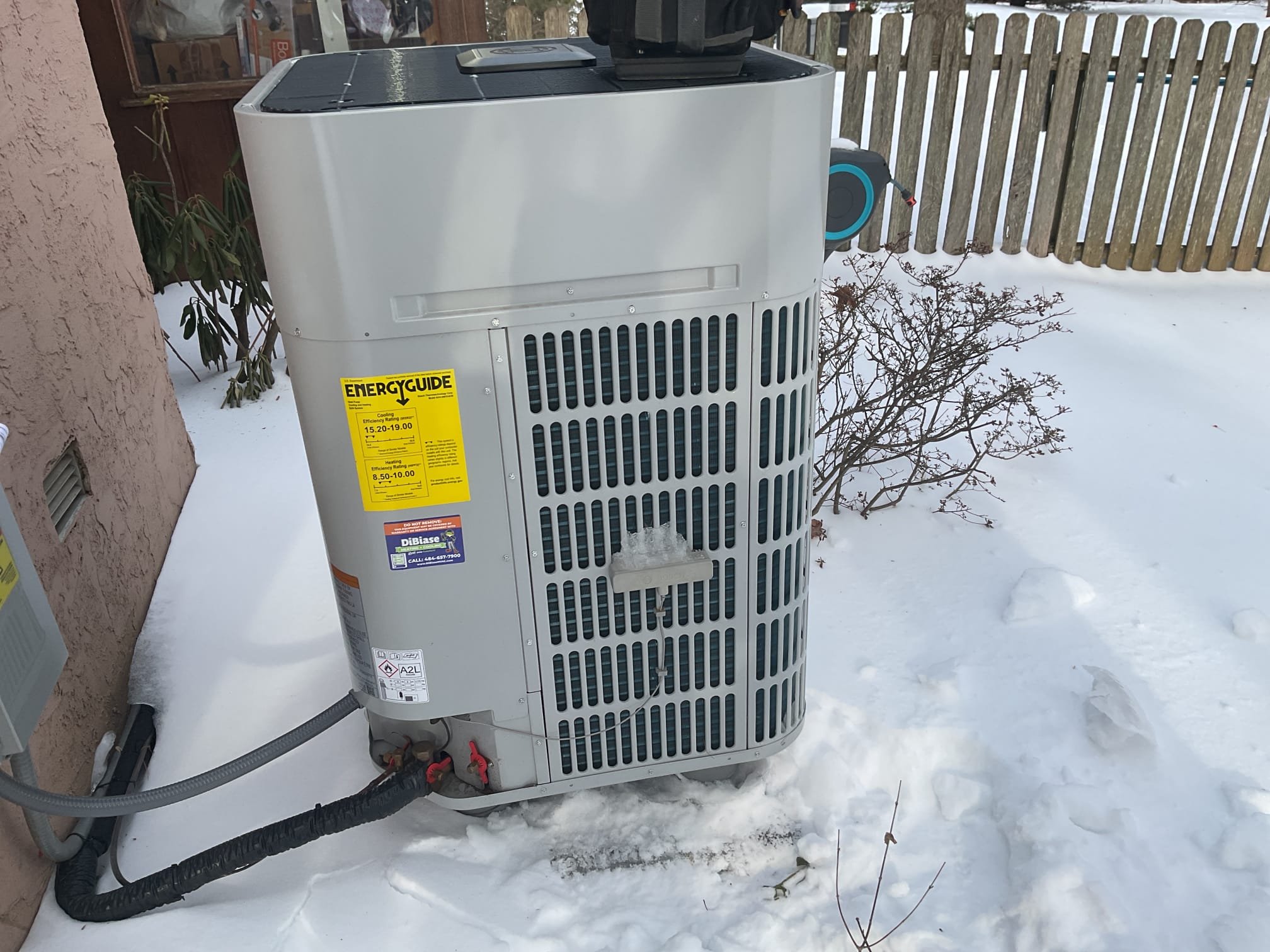 Fully assessed defrost situation. Found thermostat set to 70 degrees when we arrived and calling for heat. Found system was completely defrosted at this time. Looked over install manual for defrost settings. Only two settings could be changed one was to reduce heating run time by 10% turned this dip switch on. Also turned on dip switch to extend defrost by 60 seconds, these are the only settings that can be adjusted. Also checked over all settings in the thermostat from install they were correct. Checked 454b refrigarant pressures on digital read out they were 272/55 very good let homeowner know the changes that were made. No charge due to recent install. Heat pump is working properly at time of service. 