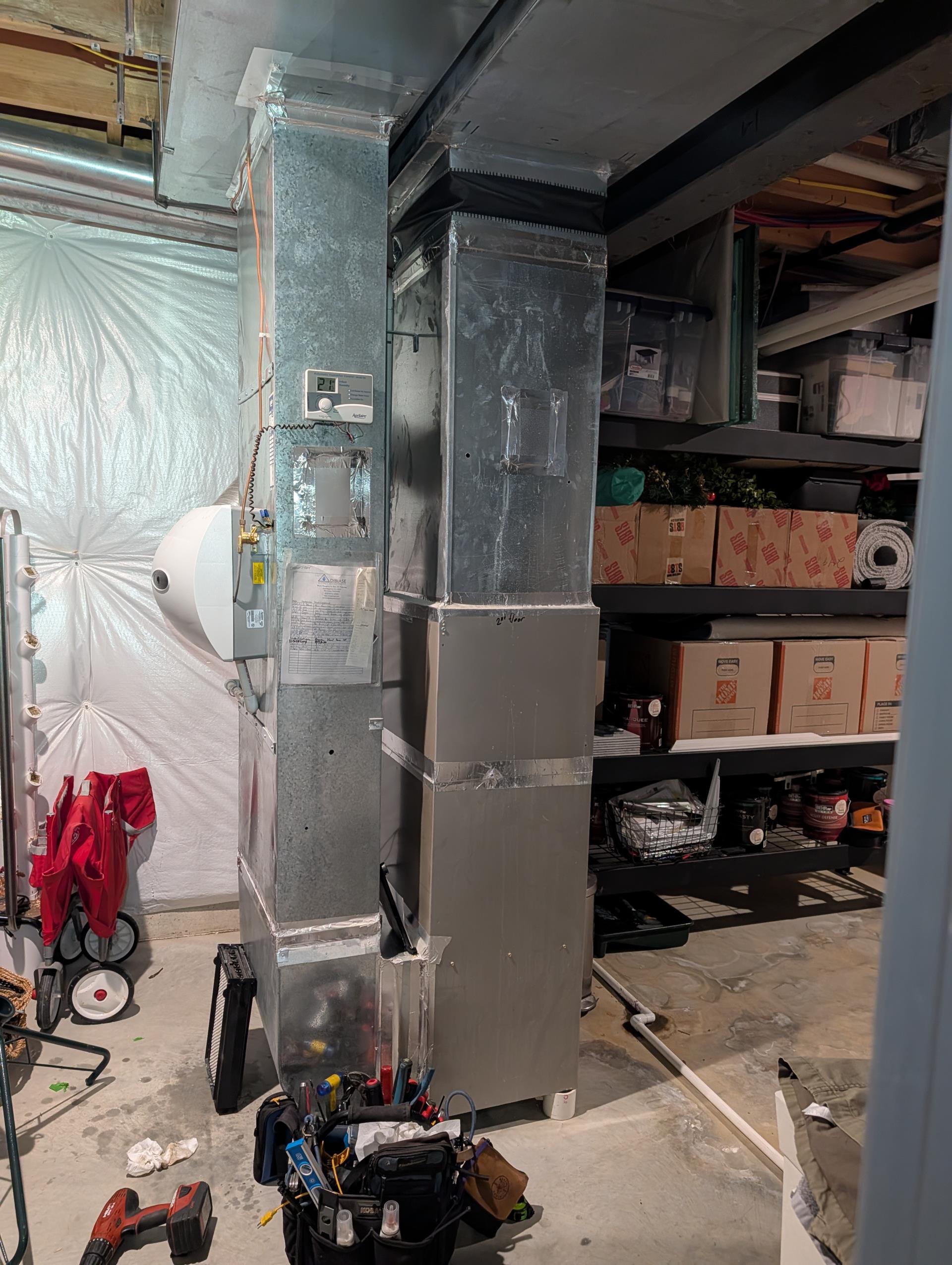 There was a bad splice at furnace preventing and therefore no continuity of common back to nest thermostat causing blank thermostat to second floor master bedroom. I fixed bad connection at common. 24V now present at 2nd floor thermostat. 

Replaced filter for first floor system had lots of drywall dust. He replaced the second floor not long ago. Replace filters monthly. Total of (2) 16x25x1 filters.

Second floor furnace passes combustion test. Flue gas temperature is a little high 140°.  Furnace is no longer working at designed efficiency
Replaced filter for first floor unit. Was covered in drywall dust. 

Second floor system is an 80,000 BTU carrier high efficiency propane furnace with 2.5 ton AC. Full System dates to 2013. 

First floor system is a Bosch propane furnace (high efficiency) installed by us in  April 2023with a 3 Ton AC. AC is dates to 2013 Carrier. 

1st floor humidifier ok.
2nd Floor humidifier leaking. Needs new drain spud and maintenance kit. Left email estimate.
L