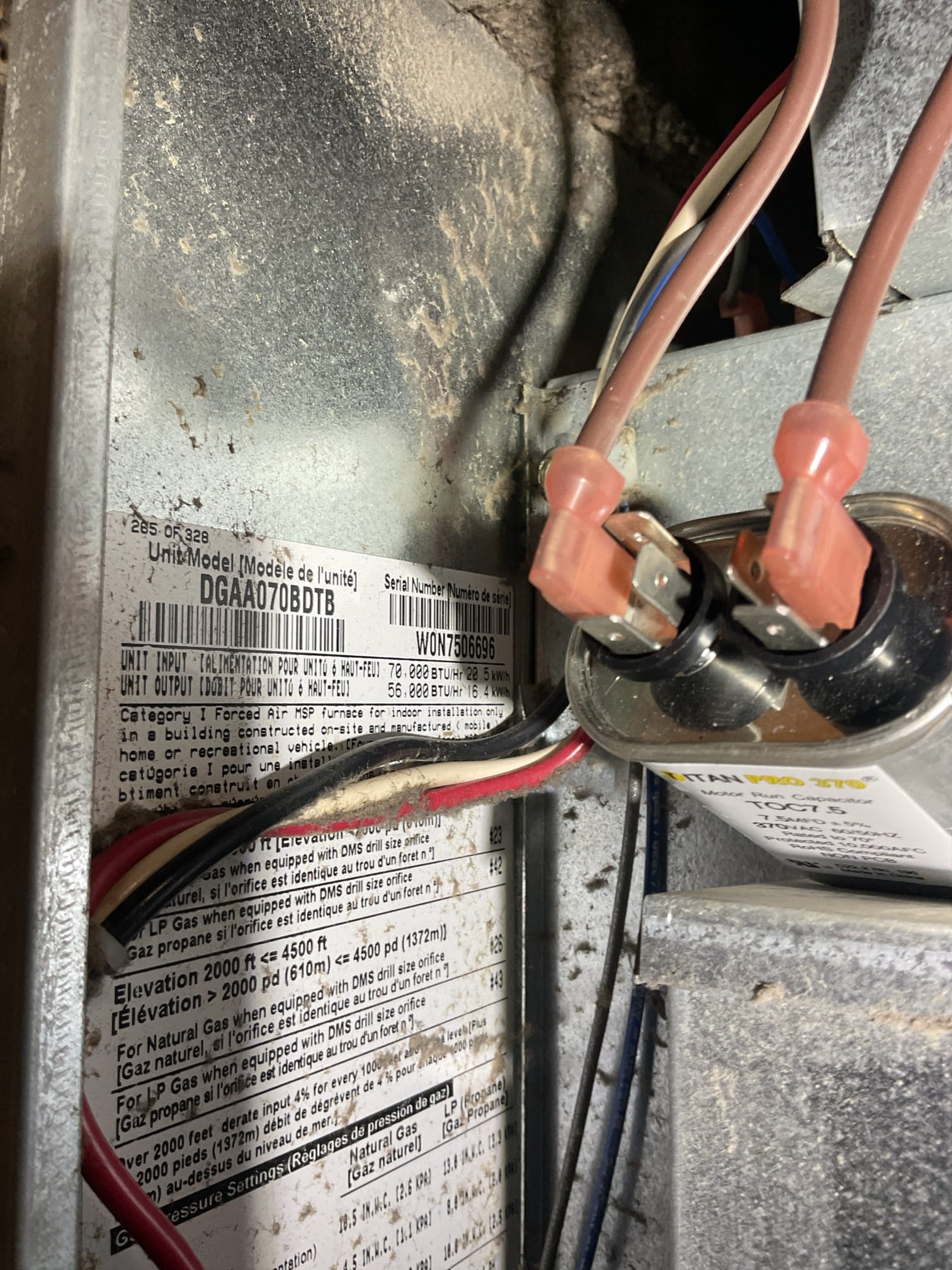 On Sunday during snowstorm with lots of wind is when the unit was giving them trouble.
They called a friend who is in HVAC he cleaned the flame sensor and inspected the ignition components. The flame would intermittently cut out on them. 
There is a pressure switch checking for .1” of draft.
It is possible that on Sunday during snowfall and 
 wind The unit was not able to produce the draft. I measured -.26” there with manometer today. 
They recently had the Packard draft motor (1/150 HP) replaced.
Told them to replace the (2) 16x20x1 filters soon. 

Ignitor and flame sensor are in bad shape. Unit is from 2007. 

Left separate estimates to replace ignitor and flame sensor. 

Unit did not cut off and had no issue with trial for ignition when I was here. Temp rise 48/98= 50°
 Itold them to talk to our management about consultation for new system considering age or at least anticipate needing to replace unit soon. 

System operating well at this time. 

Could not do combustion test roof ha