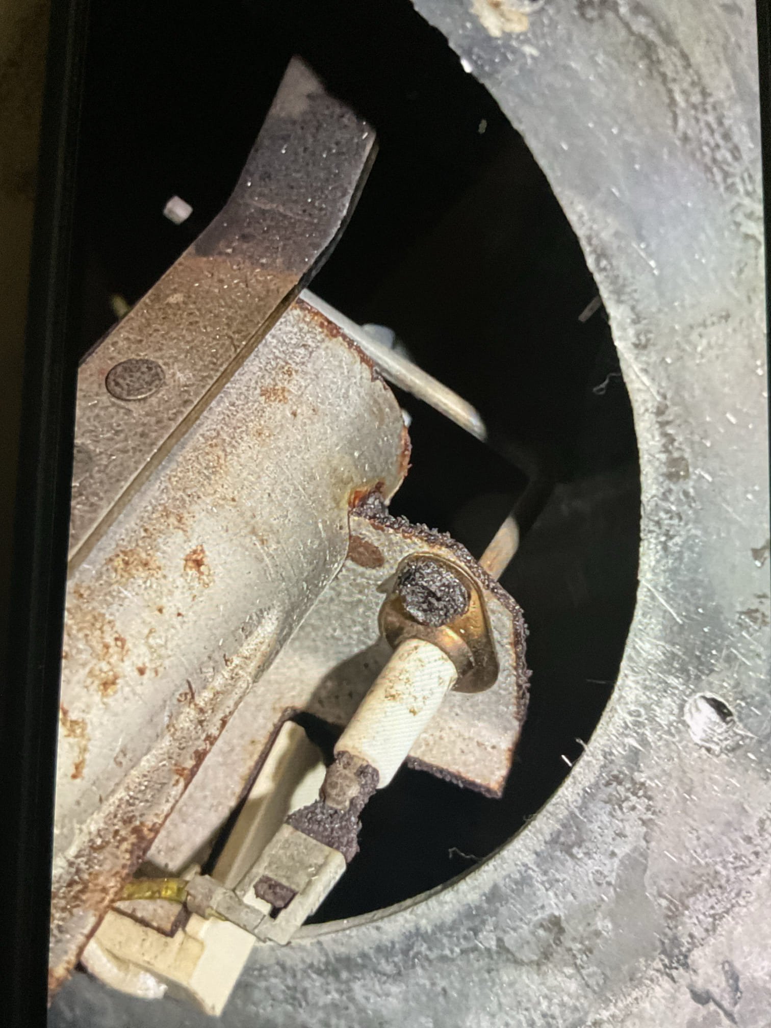 On Sunday during snowstorm with lots of wind is when the unit was giving them trouble.
They called a friend who is in HVAC he cleaned the flame sensor and inspected the ignition components. The flame would intermittently cut out on them. 
There is a pressure switch checking for .1” of draft.
It is possible that on Sunday during snowfall and 
 wind The unit was not able to produce the draft. I measured -.26” there with manometer today. 
They recently had the Packard draft motor (1/150 HP) replaced.
Told them to replace the (2) 16x20x1 filters soon. 

Ignitor and flame sensor are in bad shape. Unit is from 2007. 

Left separate estimates to replace ignitor and flame sensor. 

Unit did not cut off and had no issue with trial for ignition when I was here. Temp rise 48/98= 50°
 Itold them to talk to our management about consultation for new system considering age or at least anticipate needing to replace unit soon. 

System operating well at this time. 

Could not do combustion test roof ha