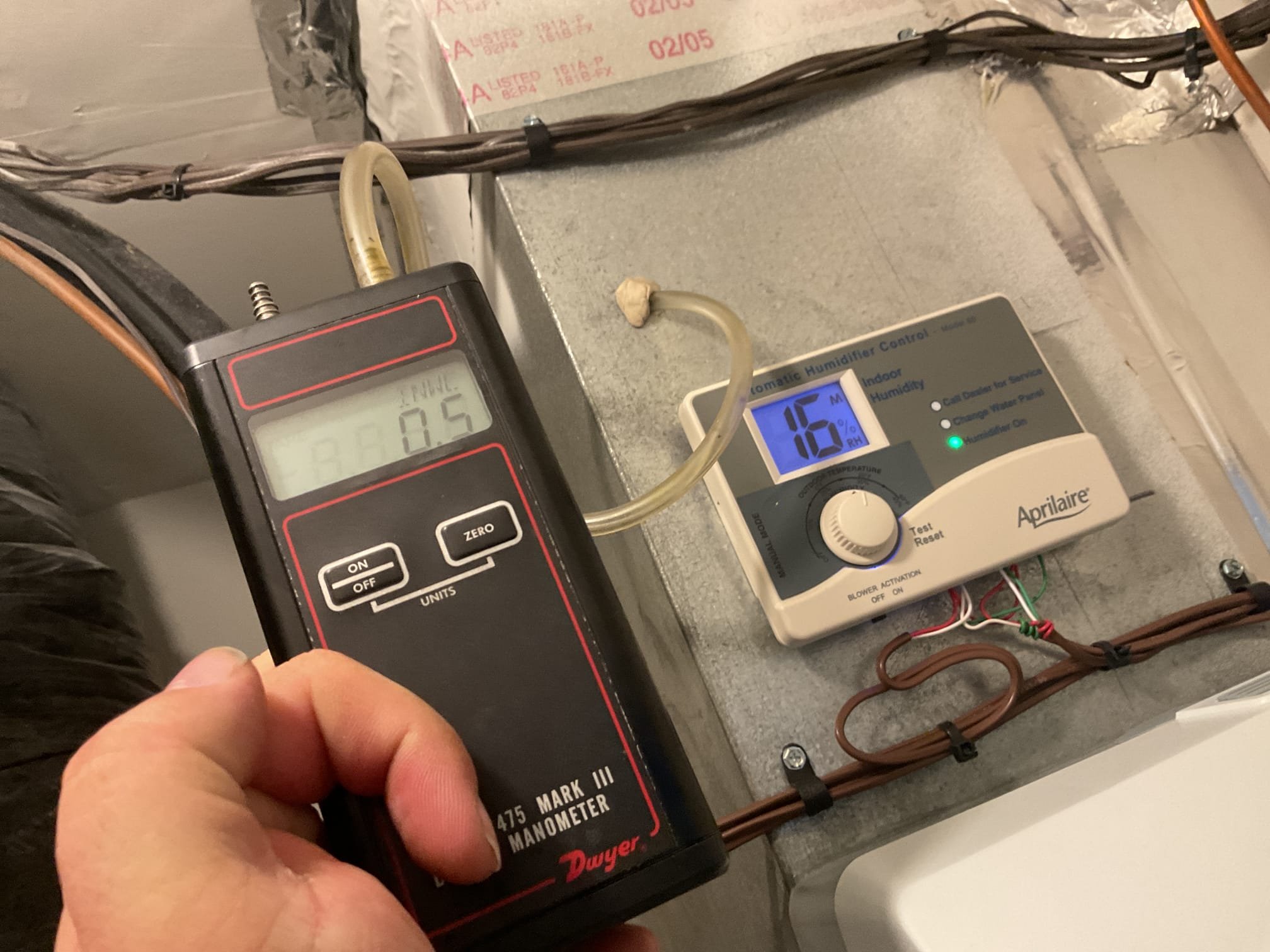 Fully assessed water leaking situation on humidifier. Opened up humidifier and found feed tube was not installed correctly by homeowner it was over top of the humidifier tray. Showed homeowner this and installed correctly. Took static pressure readings when only the top floor zone was calling. Return after the filter static and before the coil was 1.7. Over all static was 1.3 w.c.. made adjustments in cool cloud from from 83% on high stage to 81%. Also adjusted trim from zero to -4%. This is as low as the high stage can be adjusted. Talked to management about possibly of using a pressure switch to open up the solenoid when the static becomes to high. Our office to provide a solution. Customer is not happy at this time and wanted the humidifier issue resolved today. 