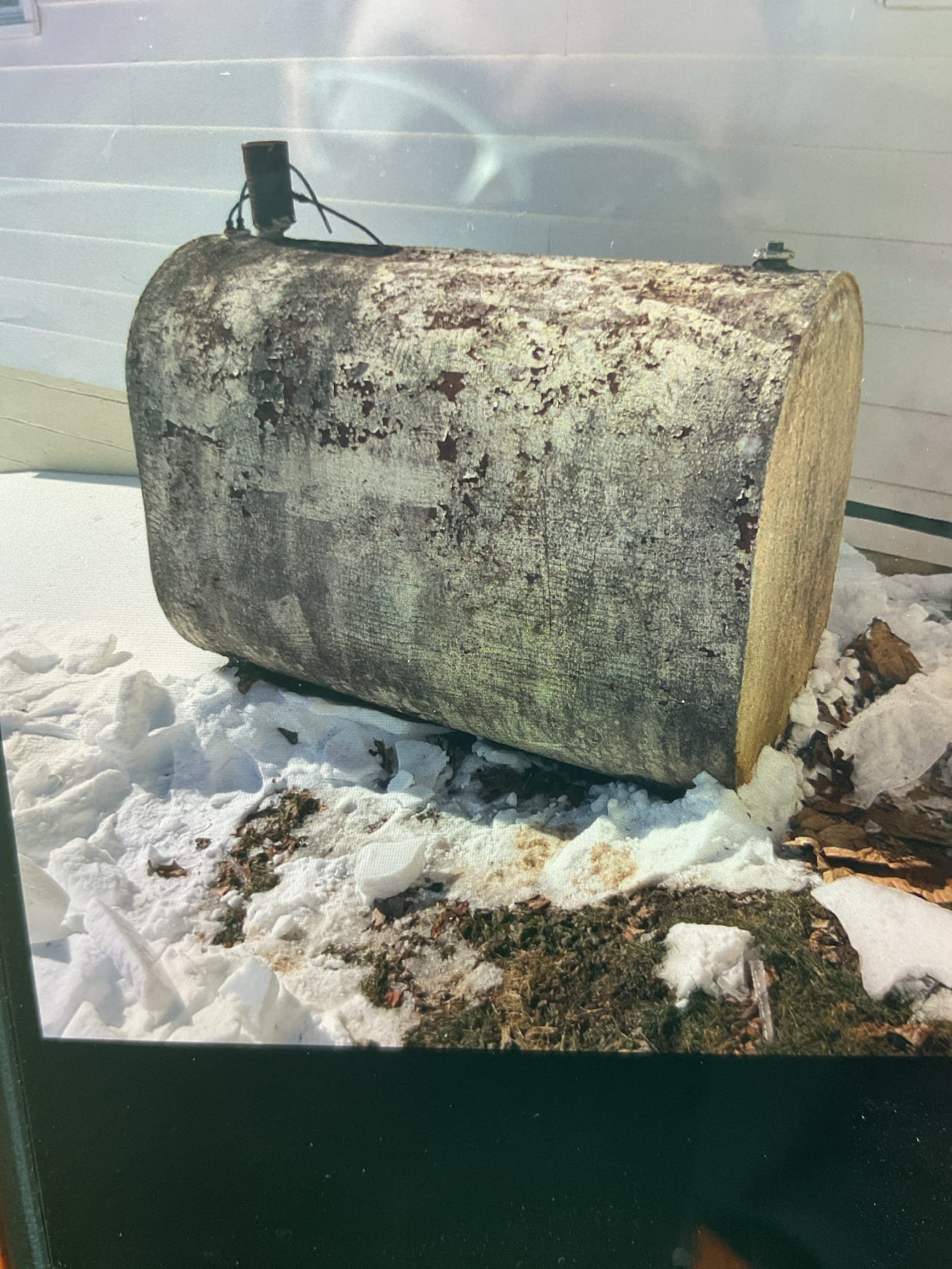 Found primary control in a hard lockout. 
Homeowner did try resetting a couple times.

Outside Tank is less than a quarter full. Tank is in bad shape. I told Alex to remove snow from under tank.

Reset primary control out of hard lockout and with bleed through wrench I bled oil line. There was a considerable amount of air in line but after bleeding furnace fired and cad cell eye ohms flame detection was good.

I also set post purge time to 30 seconds. Was set at 0.

He said soonest he can get oil delivered is Monday. I told him he can get diesel but that he may need to bleed oil line again. He may also need to bleed oil line when oil is delivered on Monday.
I walked him through how to do it exactly.
He’s gonna get a 3/8” combination wrench and 10 gallons diesel. 