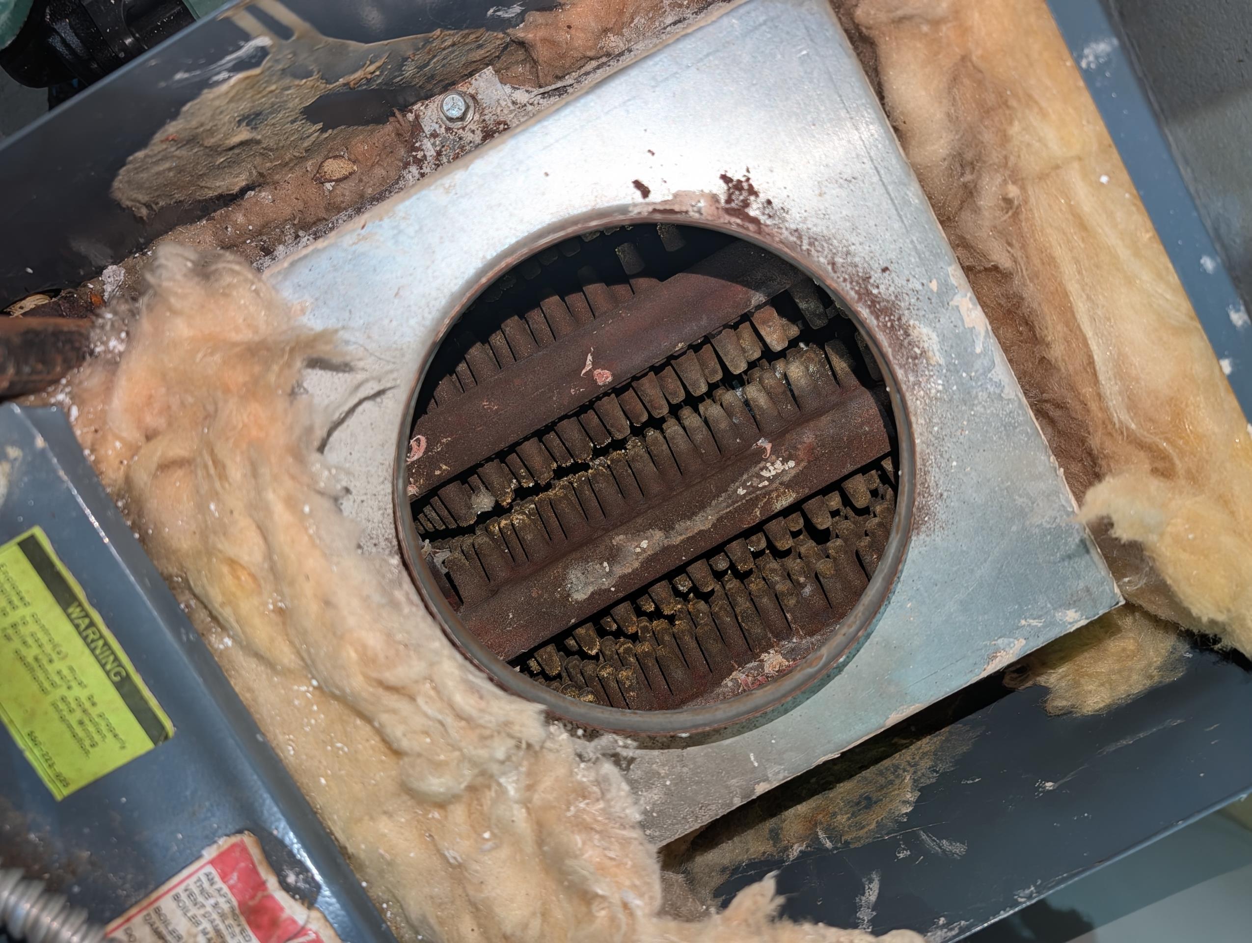 Completed heat tune up for natural gas boiler. 
2 zones. Manufacturer date 1994. So installed in mid 90s

Inspected flues and chimney
Inspected and cleaned heat exchanger, burners and burner compartment. Very little dirt or debris. 
Inspected pilot assembly. Pilot flame blue with orange tip: Good
Inspected hyrdronic components: air scoop, feed valves, expansion tank, circulator. 
Checked wiring controls and components. A surge protector can be installed at 120V feed. Provided email estimate for this. 

Also left dust with a 24x24x1 filter for air handler upcoming season. 

Combustion and draft tests: Pass

System operating well at this time. 