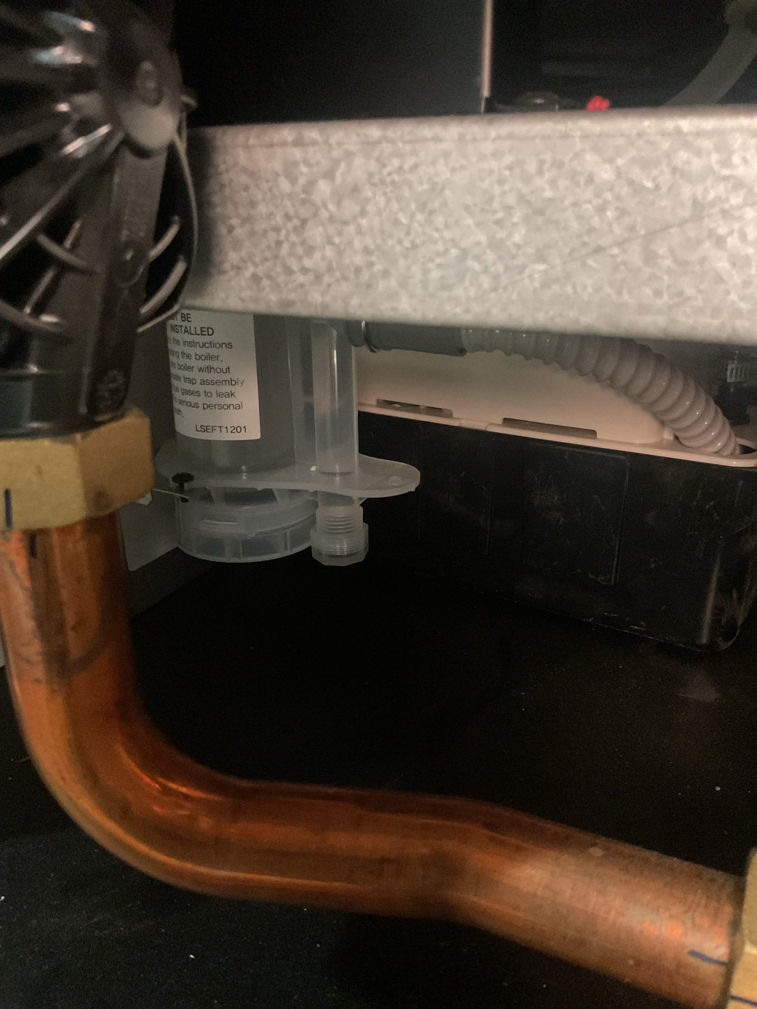 Completed QA for Laars combi boiler install.

Inspected all aspects of install: mechanical, piping, wiring, control settings.

Zone valve wiring Good
Domestic water hi setpoint is 140°F for use with 3-way mixing valve. Measured water temperature at hot tap at sink 120°F

Changed warm weather shutdown temperature to 68°F meaning the boiler will not operate in space heating mode when outdoor temperature is 68°F or warmer. 

Performed combustion test in LO and MAX fire modes and found %CO2 to be within range. (8.5%)

Homeowner says the first floor thermostat has been inaccurate. It is measured 4° lower than my temperature probe. It is a Honeywell round electronic. And what I noticed is the W contact opens a little before the thermostat reaches the target temperature. It is an old cloth low voltage wire that is stapled to wall. Would require a 2 wire thermostat and EIM to upgrade first floor thermostat. Homeowner says she’s not too concerned doesn’t want an estimate at this time. 

Boiler 