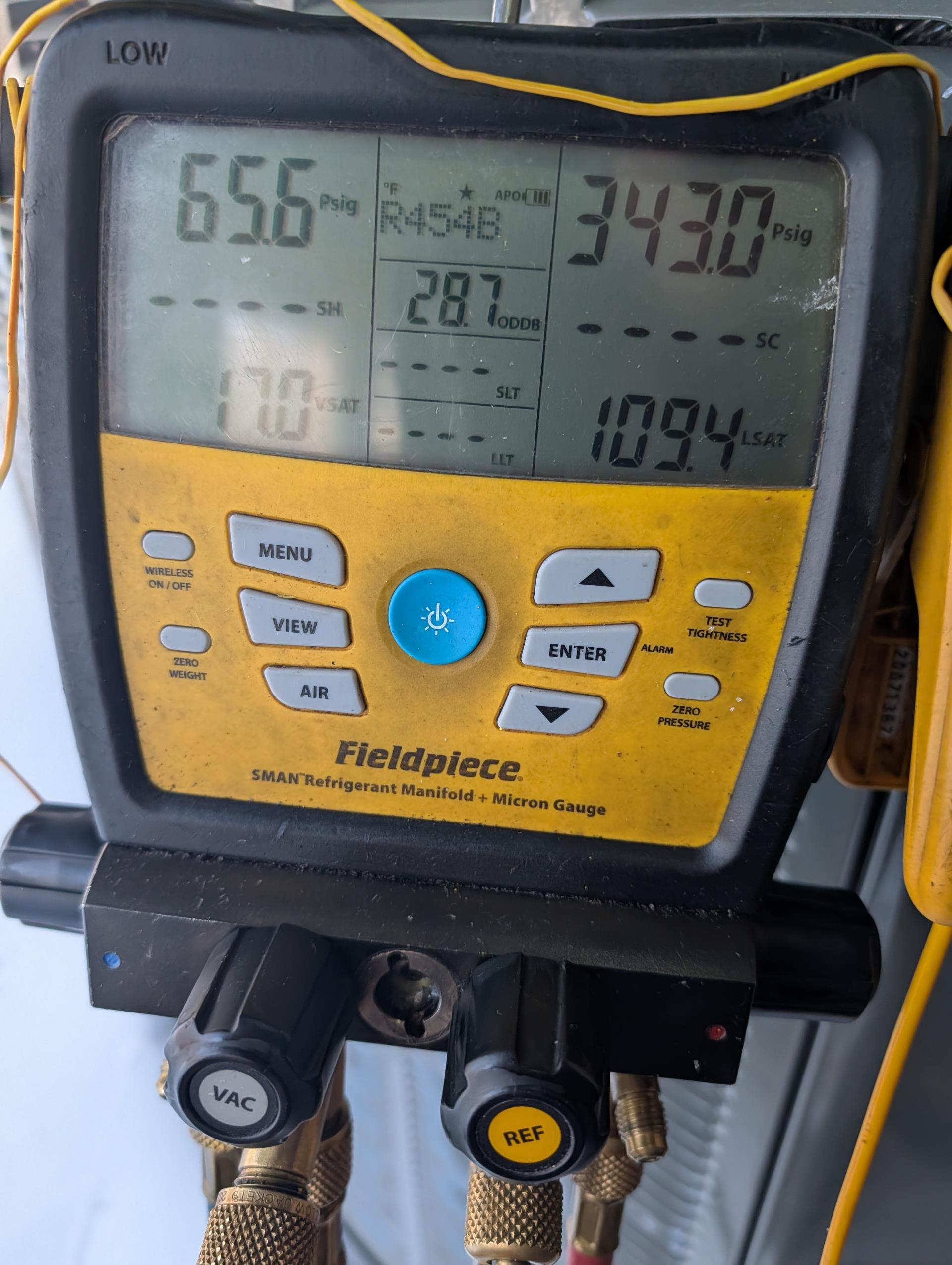 4 Ton Trane Link heat pump installed by us in July 2025
The issue is the same as before. Overnight the temperature will drop to 61-62°.
The thermostat was displaying a room  temperature of 68° system was idle.
Also found Aprilaire 413 fairly dirty with white powder akin to drywall dust.
Replaced Aprilaire 413 filter provided by homeowner. 
Found (3) supply registers in dining room and living room closed and with paper bag stuffed into them. Previous homeowners must have done this. Removed bags and opened vents.

The other thing I noticed is the return temperature measured in the duct is influenced by the basement air temperature (which is 53°) so it drops return temp to a point where return air I duct is 4° lower than the room temperature at thermostat. The basement is not heated. The basement is very likely to get very cold nighttime. 

He is considering insulating attic and crawl and sealing basement. Told him We offer consultations for home performance work. 

Ran system in charging