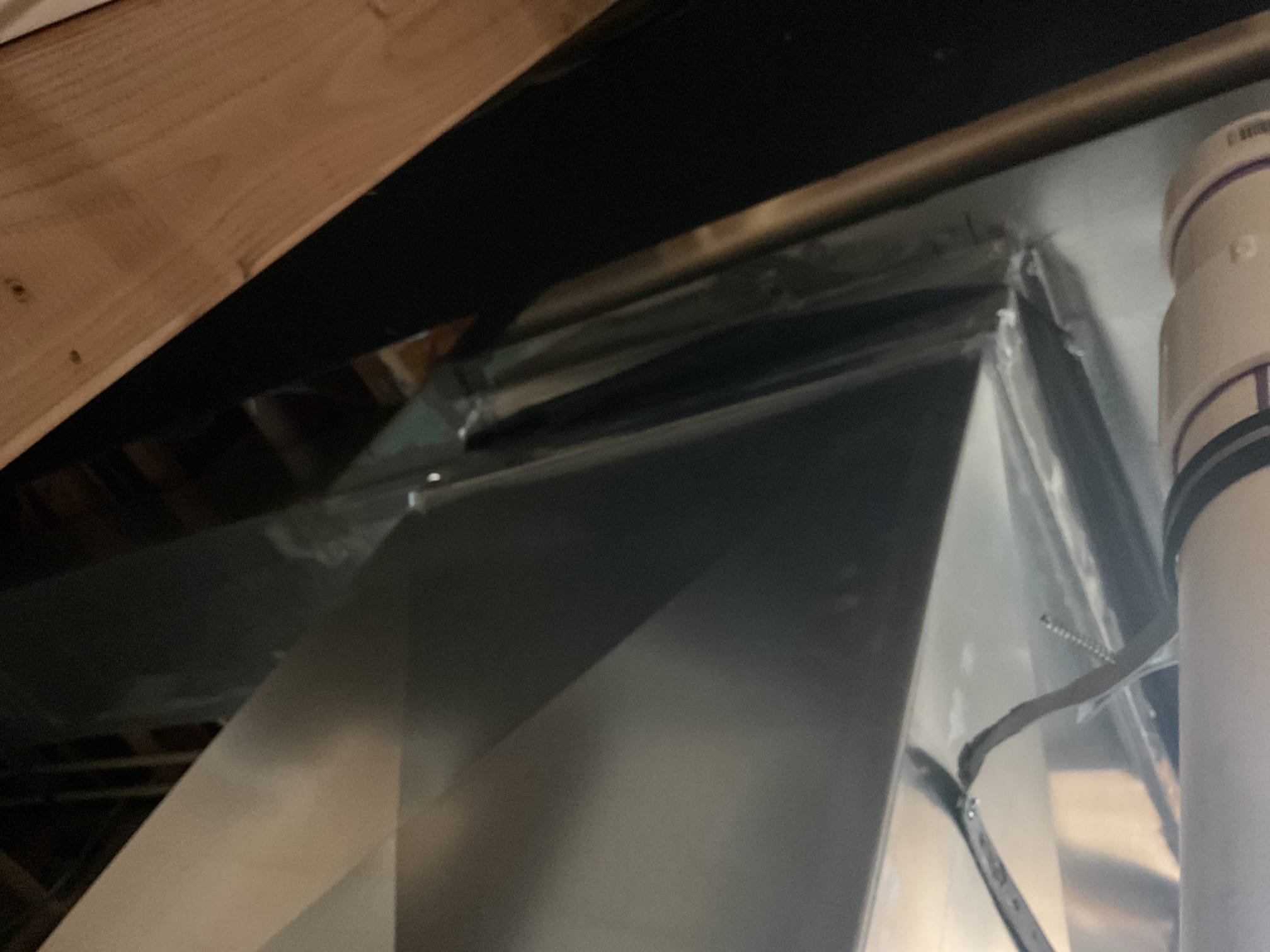 Performed quality assurance on recently installed high efficiency Goodman gas furnace and a/c. Customer pointed out that there were pipe hangers left hanging on the ductwork and duct work was not properly sealed. Removed old hangers and sealed joints with silicone supply and return. Also customer pointed out there was a black spot on the concrete in basement left by installers. Cleaned up. Checked over install. Performed combustion test. Gas furnace is working properly at time of service. 