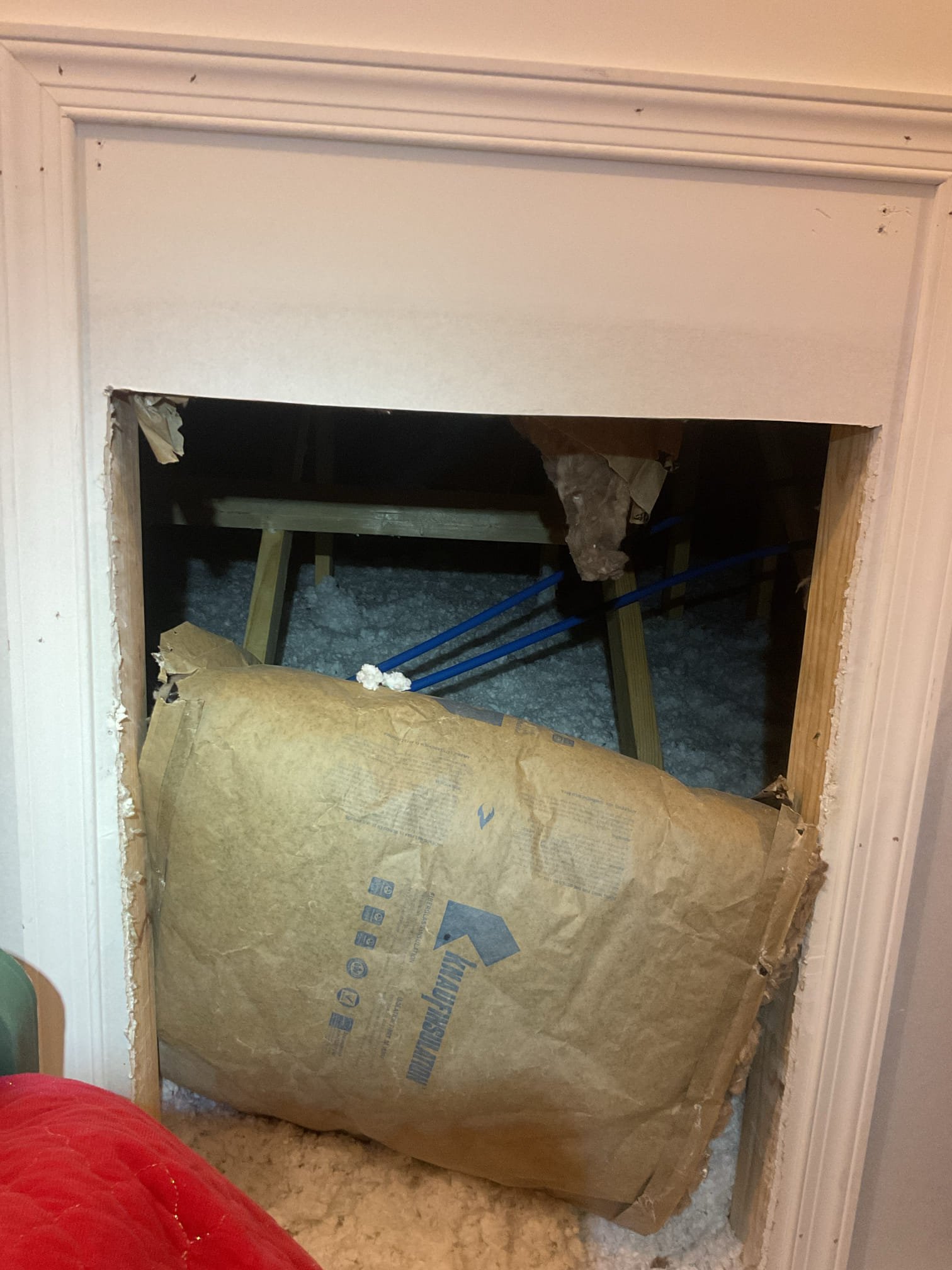 Issue was that she had no flow at all to the hot water faucets/taps.
Line that feeds Navien tankless water heater is frozen.
There is no flow at all through the heat exchanger.

Advised homeowner to contact the builder to address this. 
Will have to wait until pipe that feds water heater thaws. 
Not something I can address. 

Showed her where the manifold block is. 

There is also an access to the attic crawl upstairs in mechanical room. Showed her where this is. 