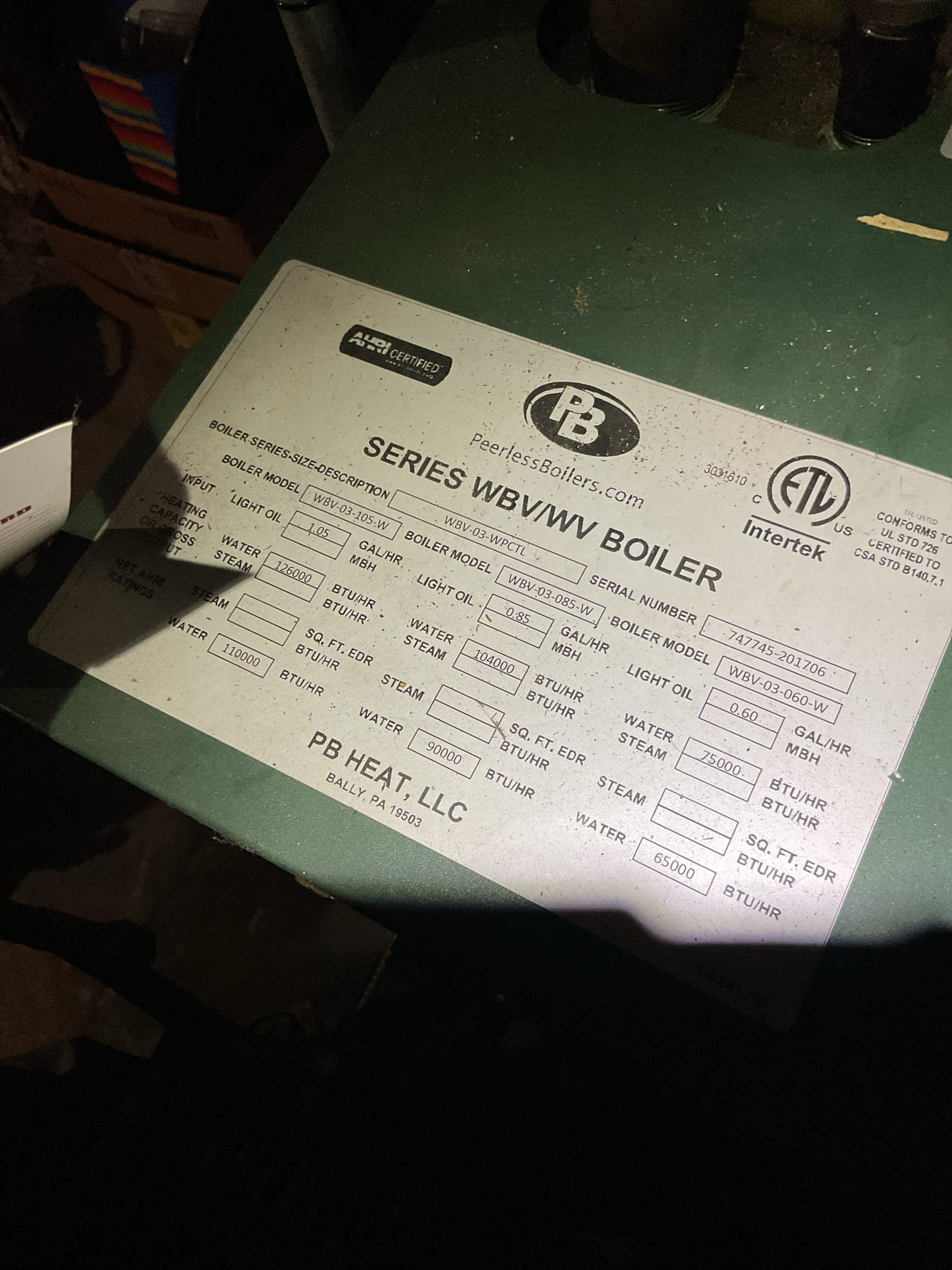 Performed Oil boiler tune up, on peerless boiler from 2019 replace new nozzle new oil filter, clean heat exchanger and flue pipe. Inspect chimney base ok. Check water pressure and temp ok. 180/155 settings on aqua stat. Clean electrodes, and cad cell.  Check ohms on primary controller ok.  Performed combustion test ok smoke and draft ok. Oil tank is older and getting some rust on the bottom of tank. Customer is aware. Boiler takes .85x80b nozzle previously had .90x80a 